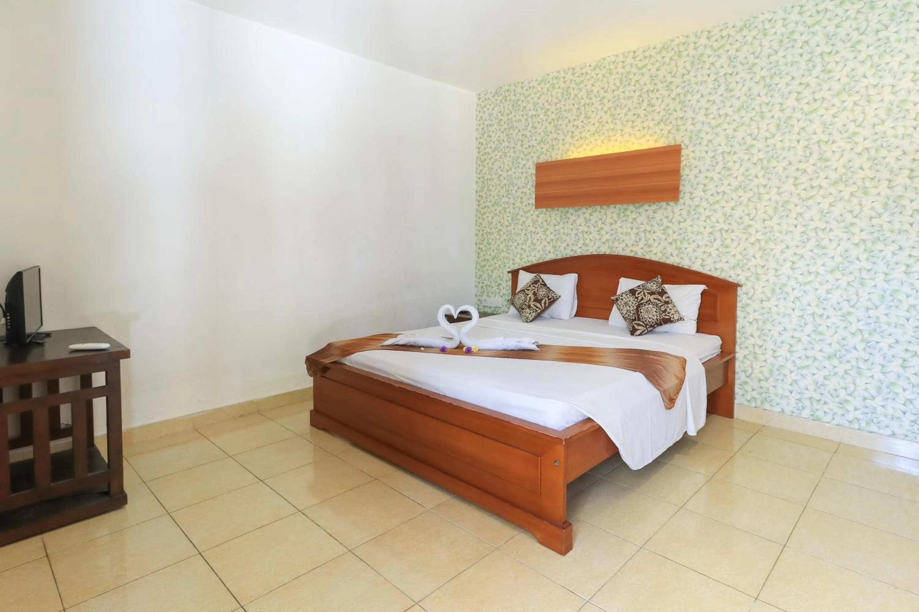 Bed in Ayu Lili Garden Hotel Kuta