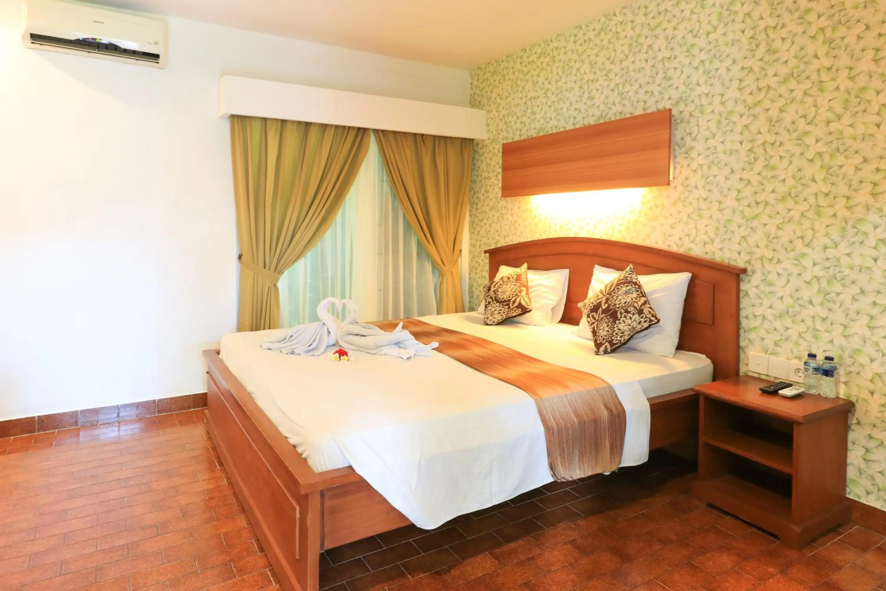 Photo of the whole room, Bed in Ayu Lili Garden Hotel Kuta