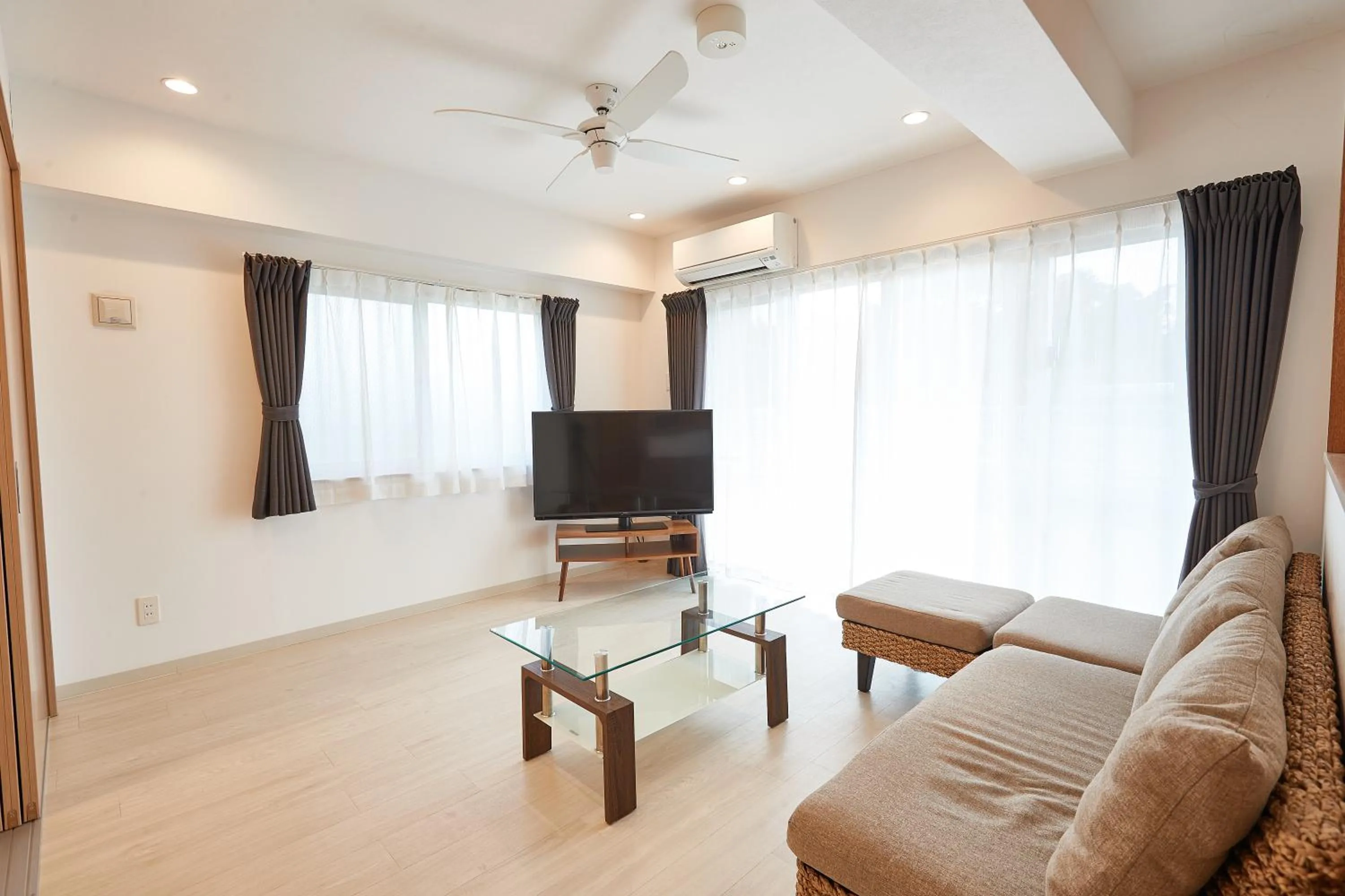 Living room in New Normal Hotel in NAGO ニューノーマルホテルイン名護