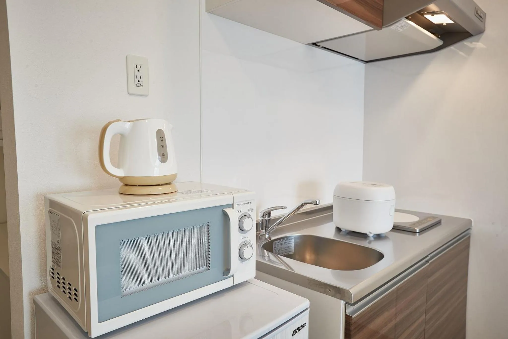 kitchen in New Normal Hotel in NAGO ニューノーマルホテルイン名護