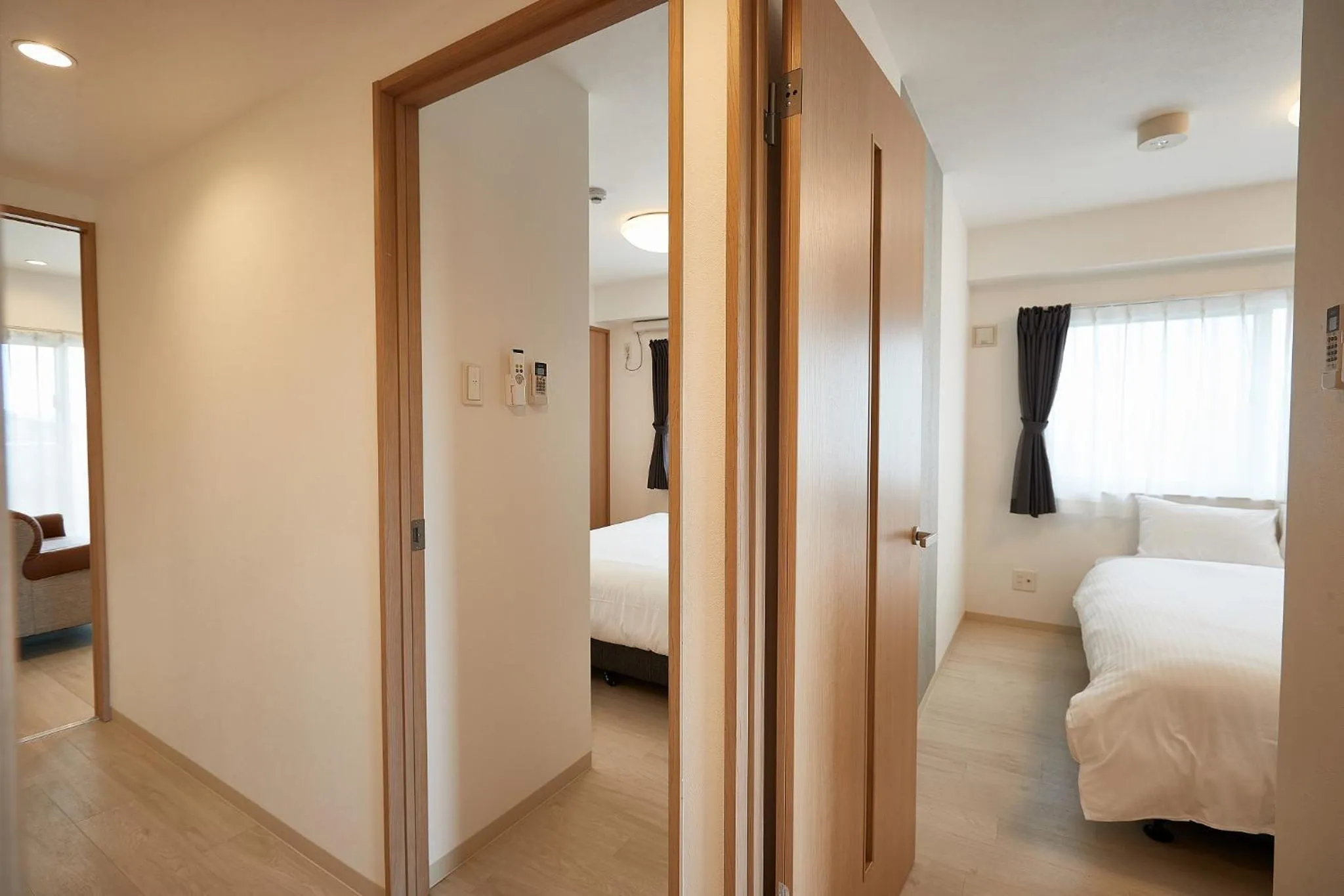 Bedroom, Bed in New Normal Hotel in NAGO ニューノーマルホテルイン名護