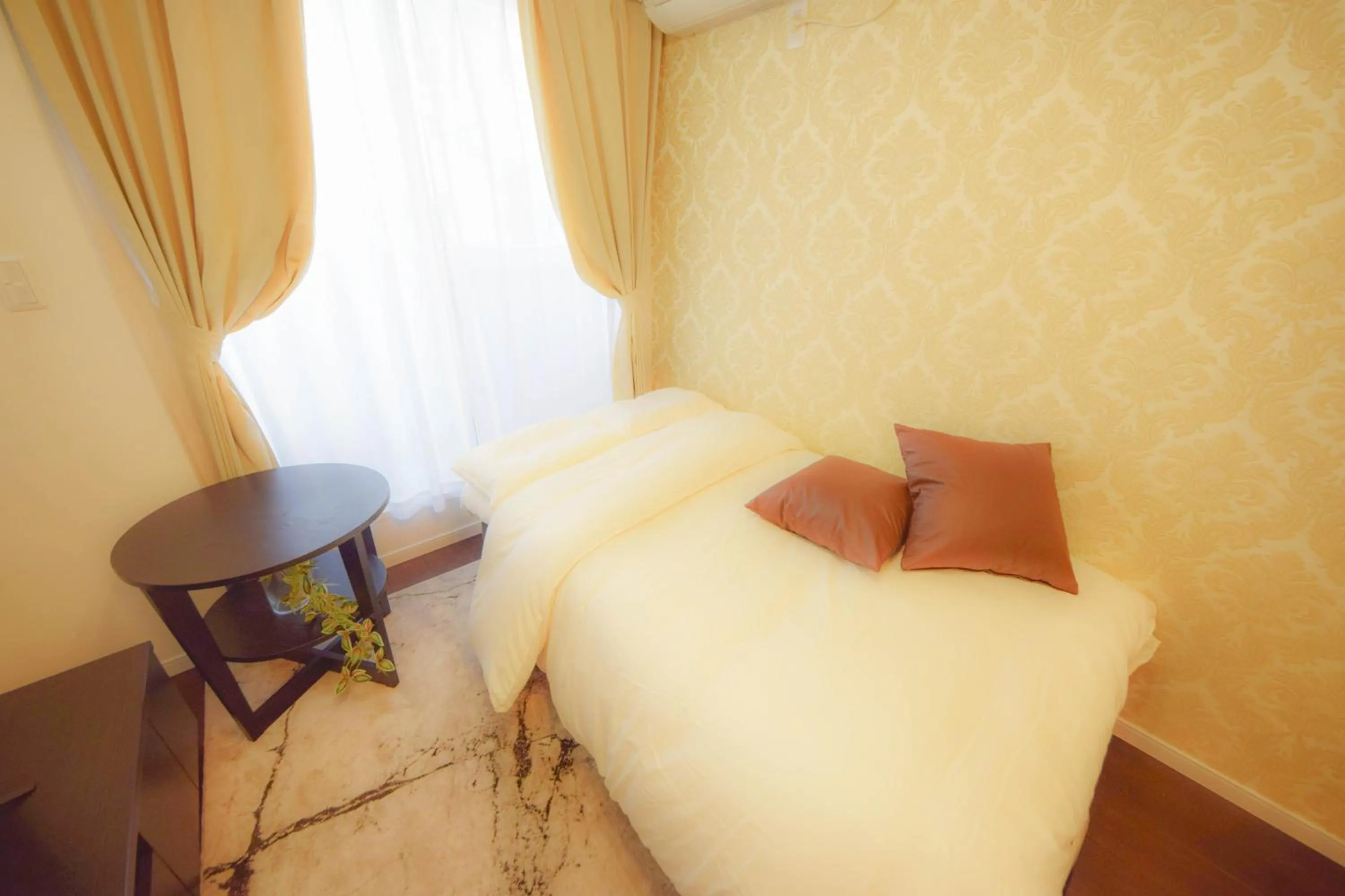 Bed in FINOA Residential Suite Kagurazaka