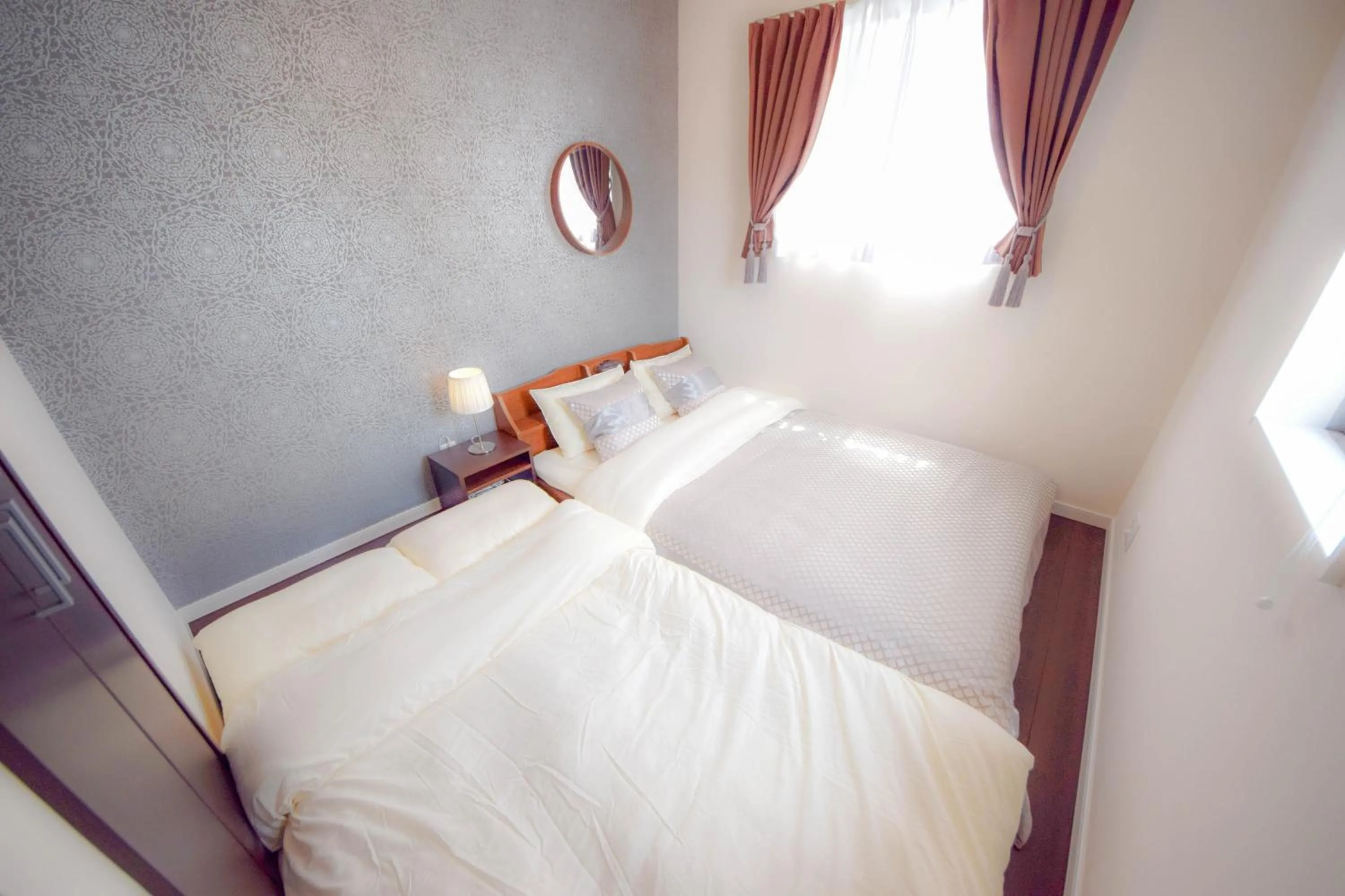 Bed in FINOA Residential Suite Kagurazaka