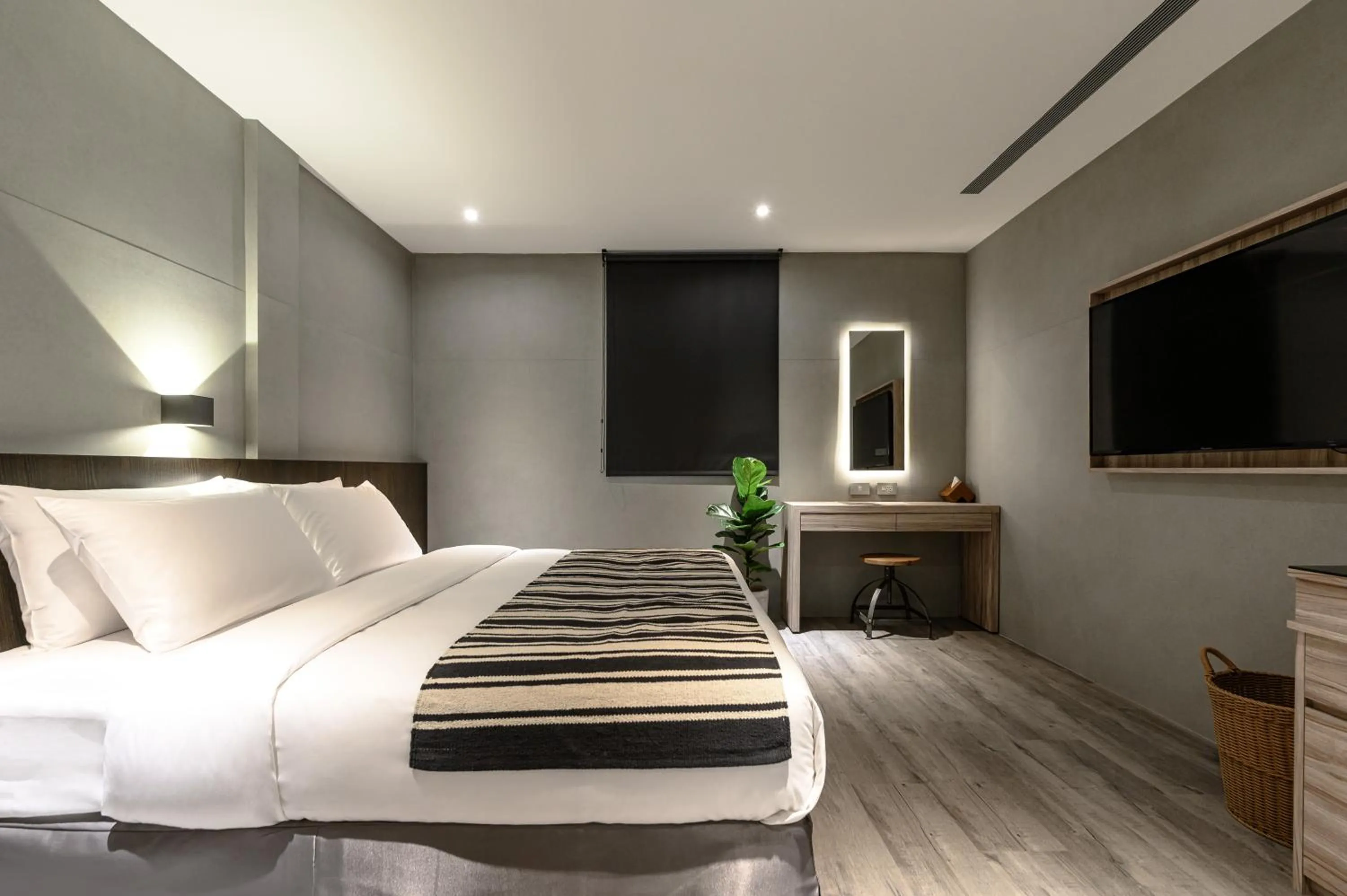 Bed in Yunoyado Onsen Hot Spring Hotel Deyang