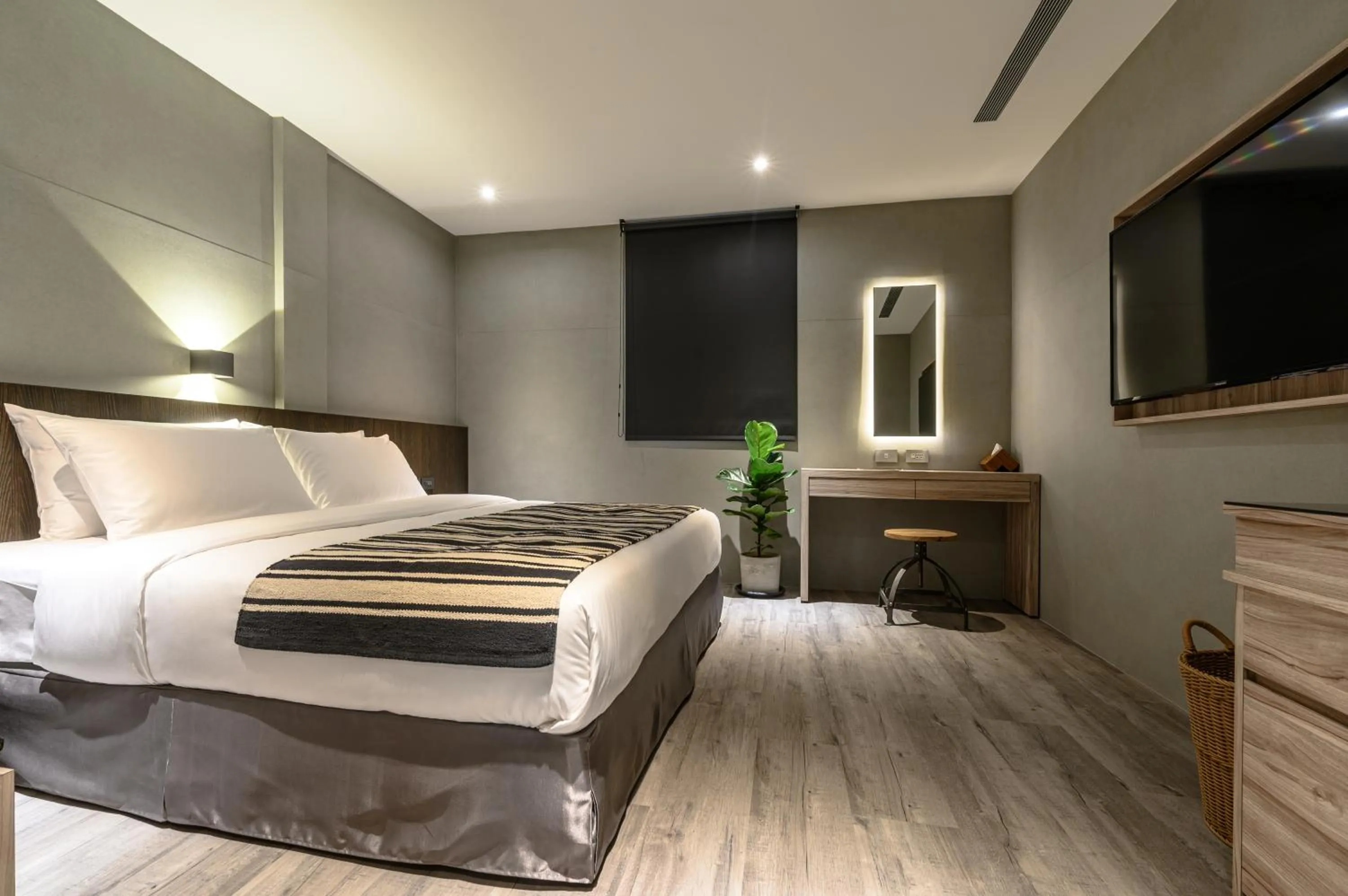 Bed in Yunoyado Onsen Hot Spring Hotel Deyang