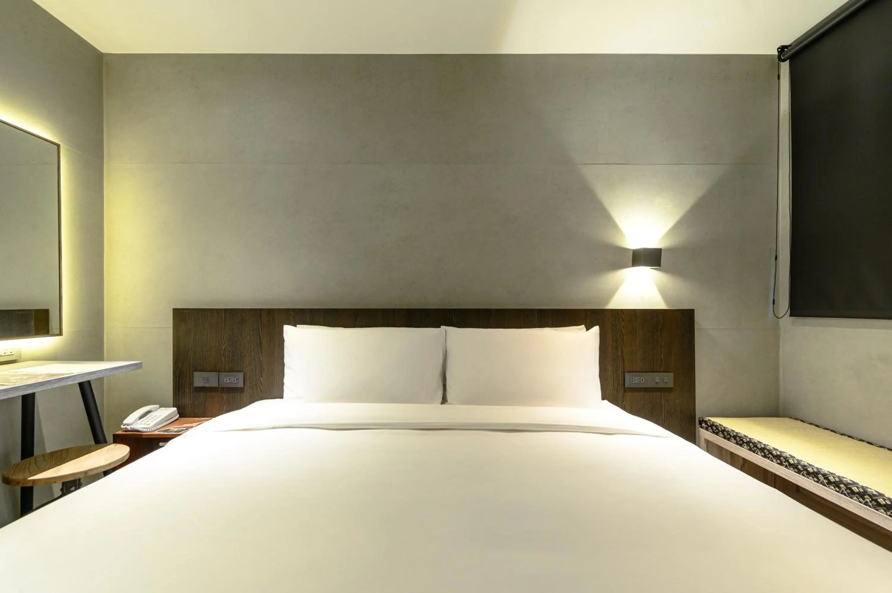 Bed in Yunoyado Onsen Hot Spring Hotel Deyang