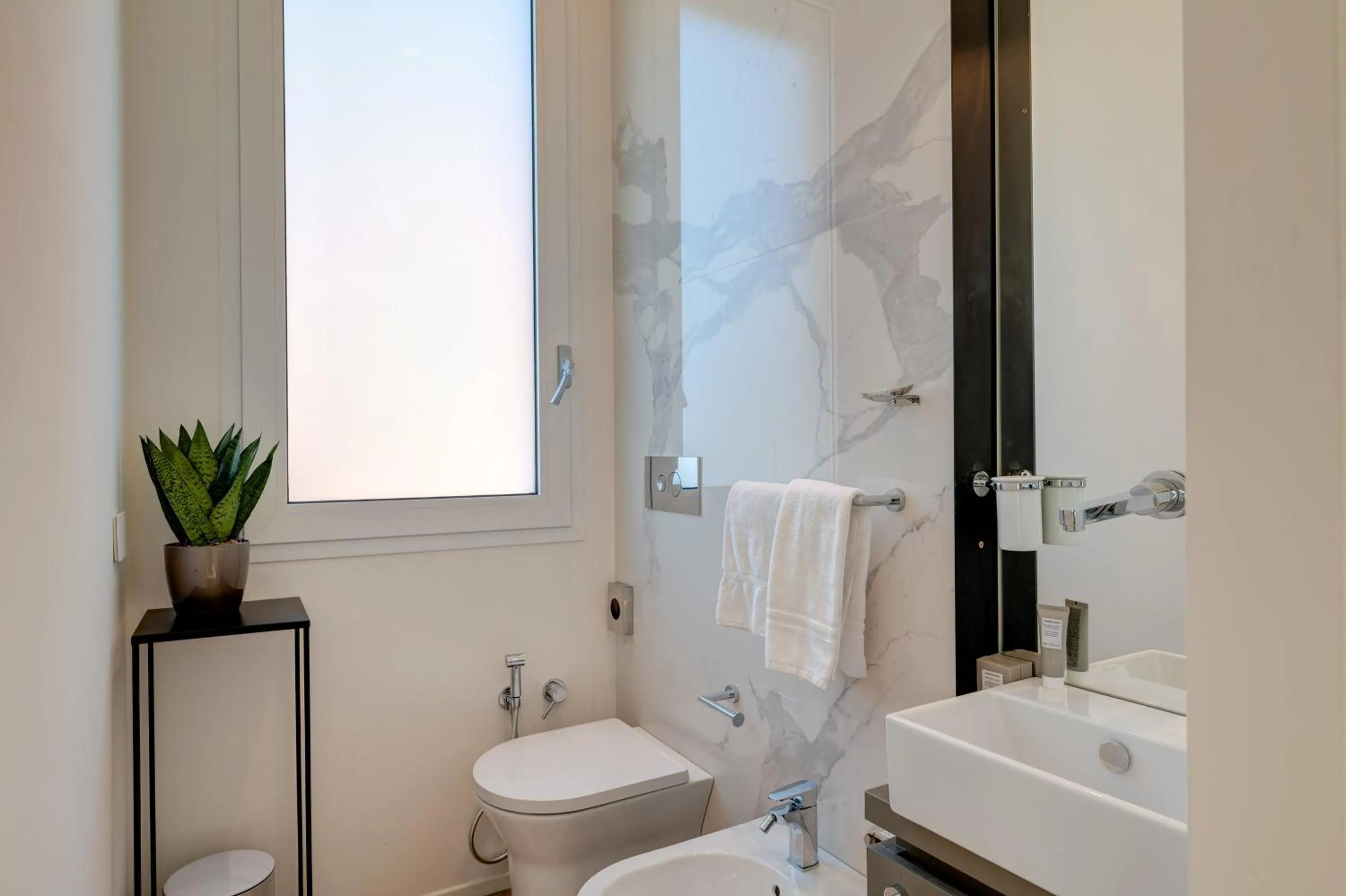 Bathroom in Le Palmette Suites