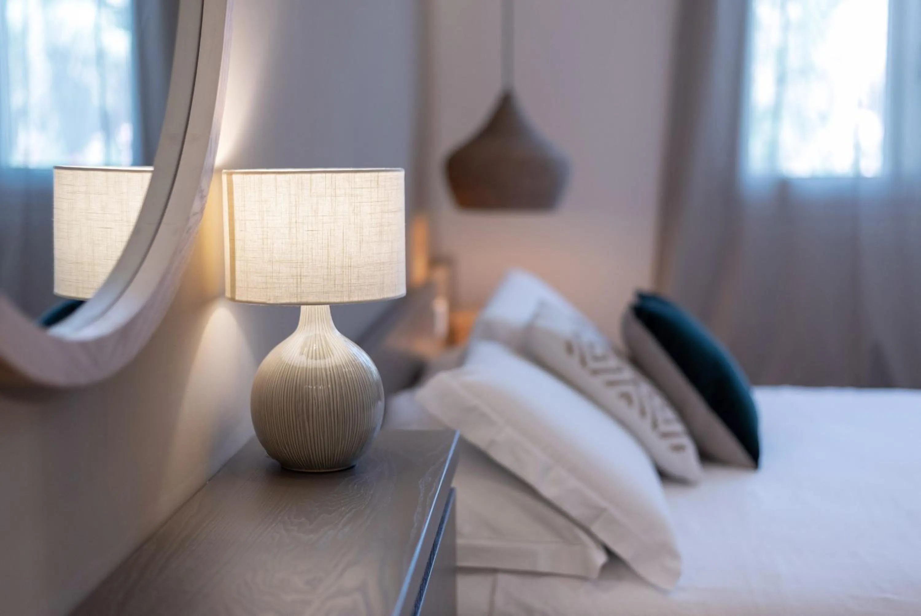 Bed in Le Palmette Suites