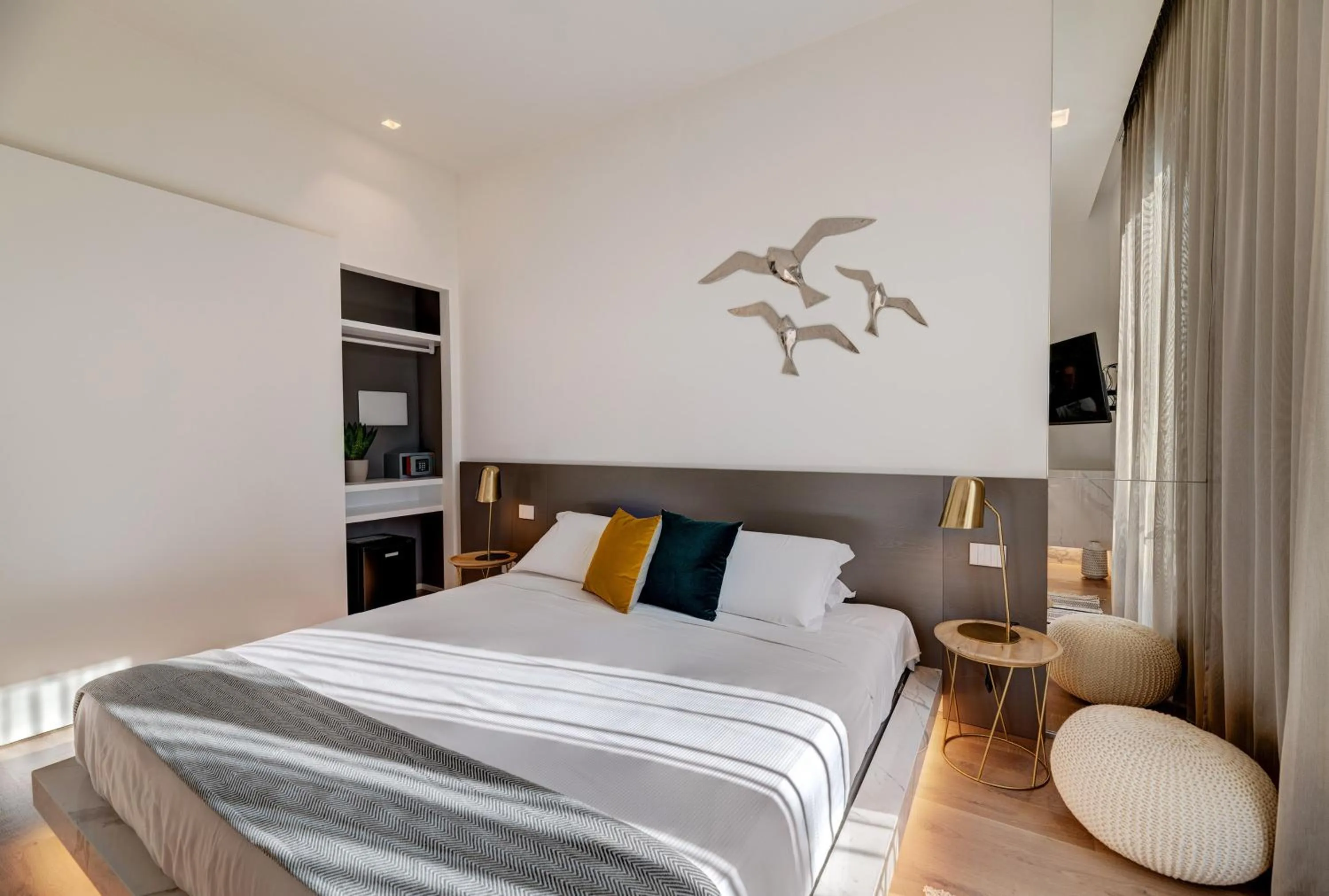 Bed in Le Palmette Suites