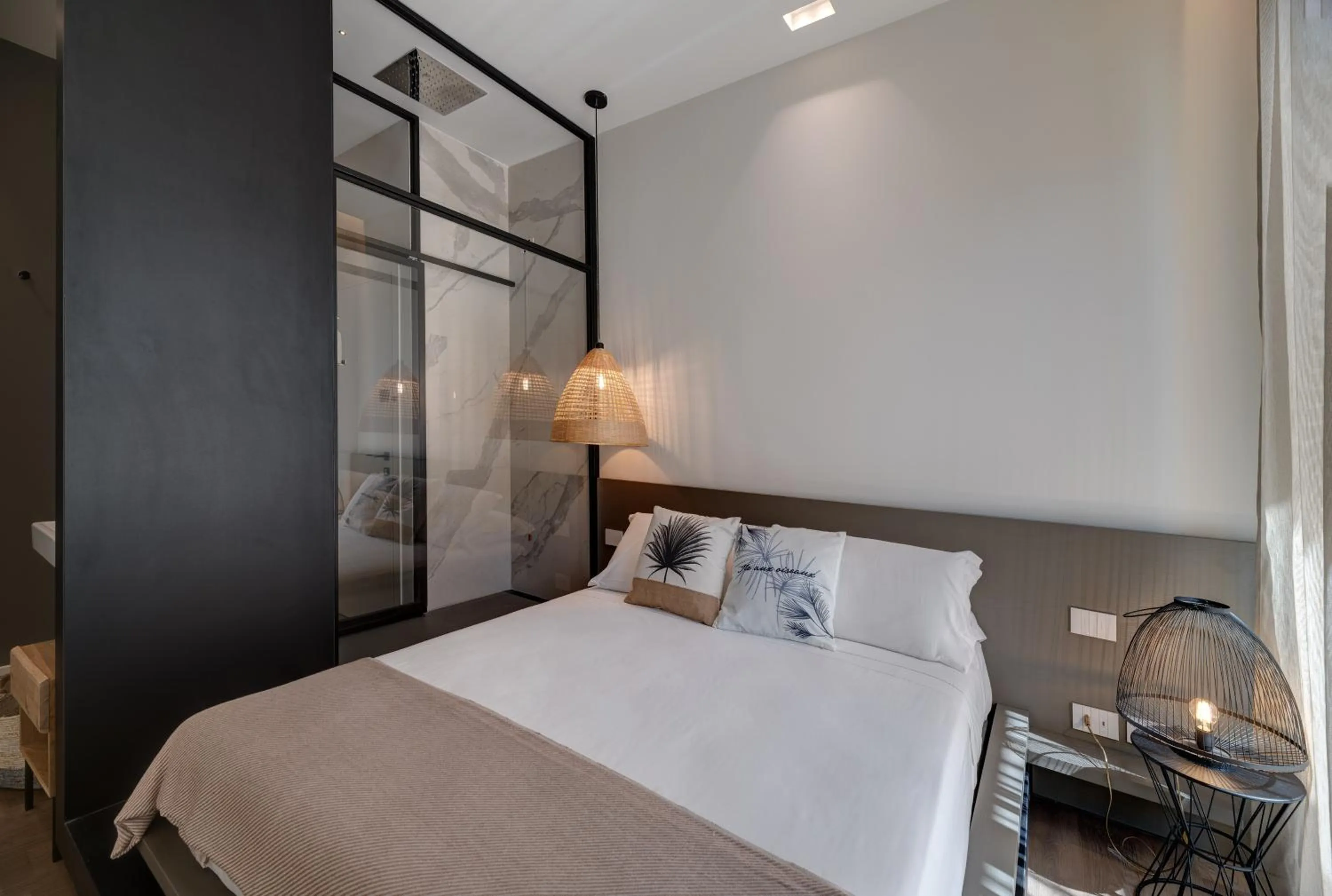 Bed in Le Palmette Suites