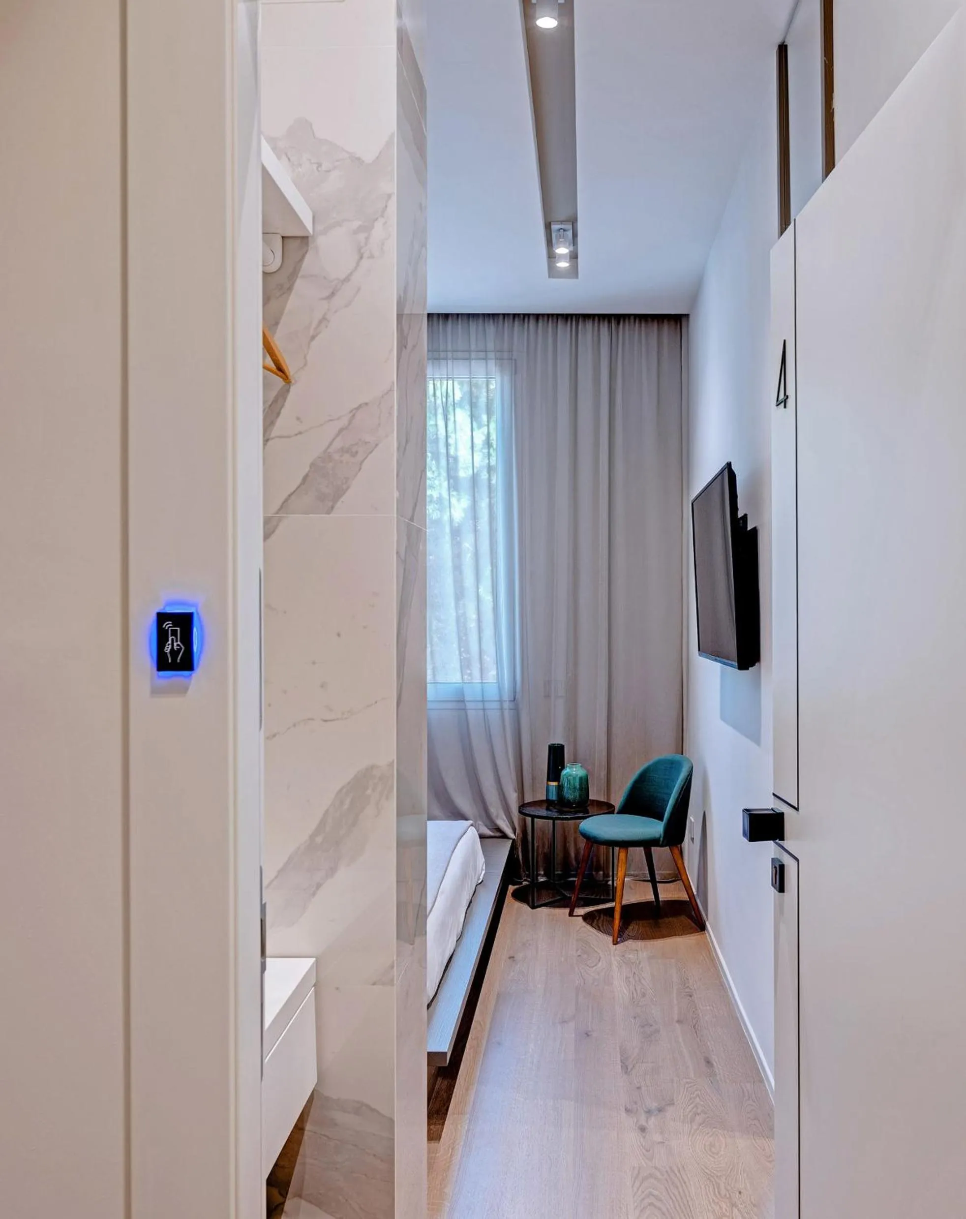 TV and multimedia, Bed in Le Palmette Suites