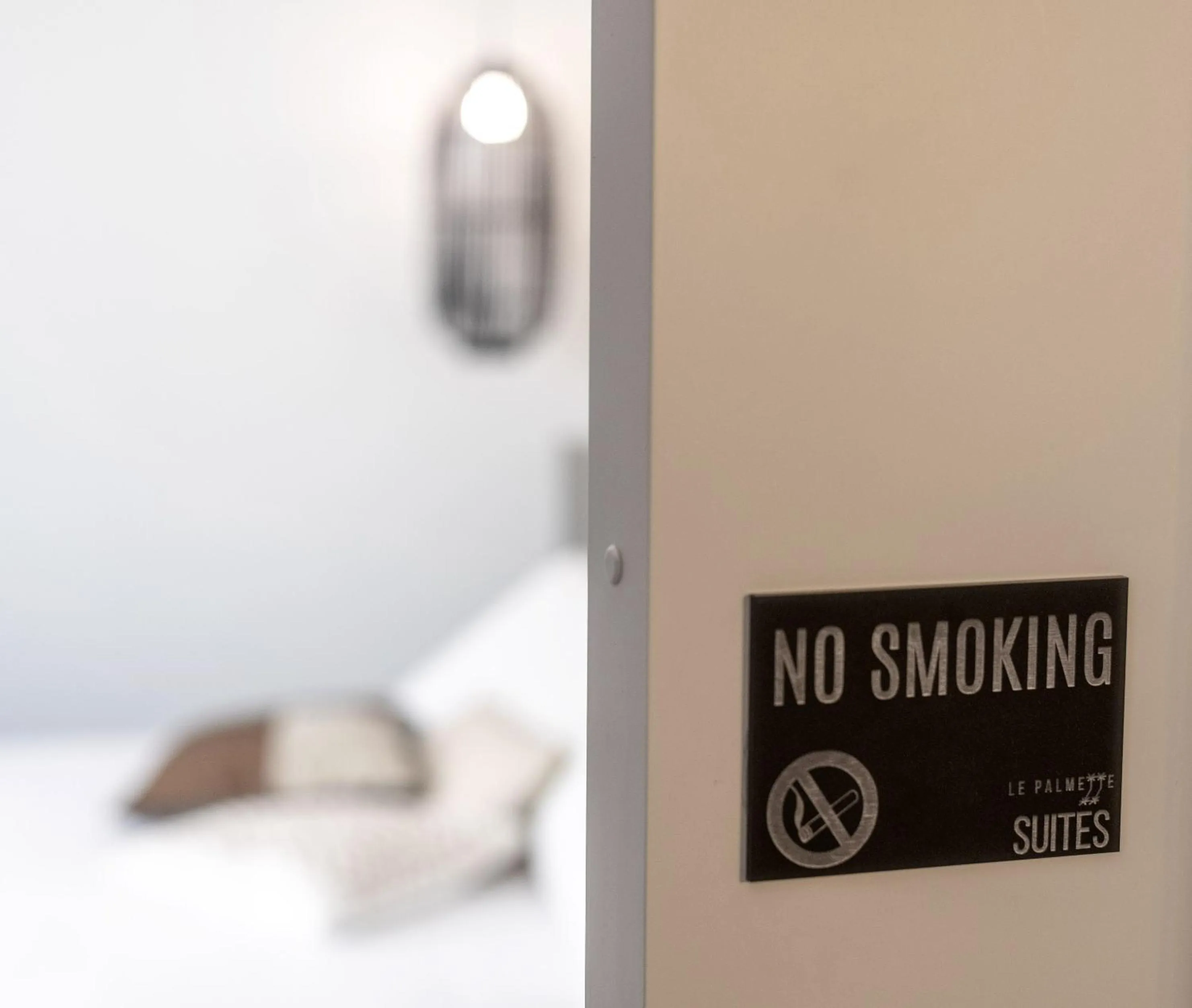 Logo/Certificate/Sign in Le Palmette Suites