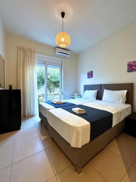 Bed in Azure Beach Villas