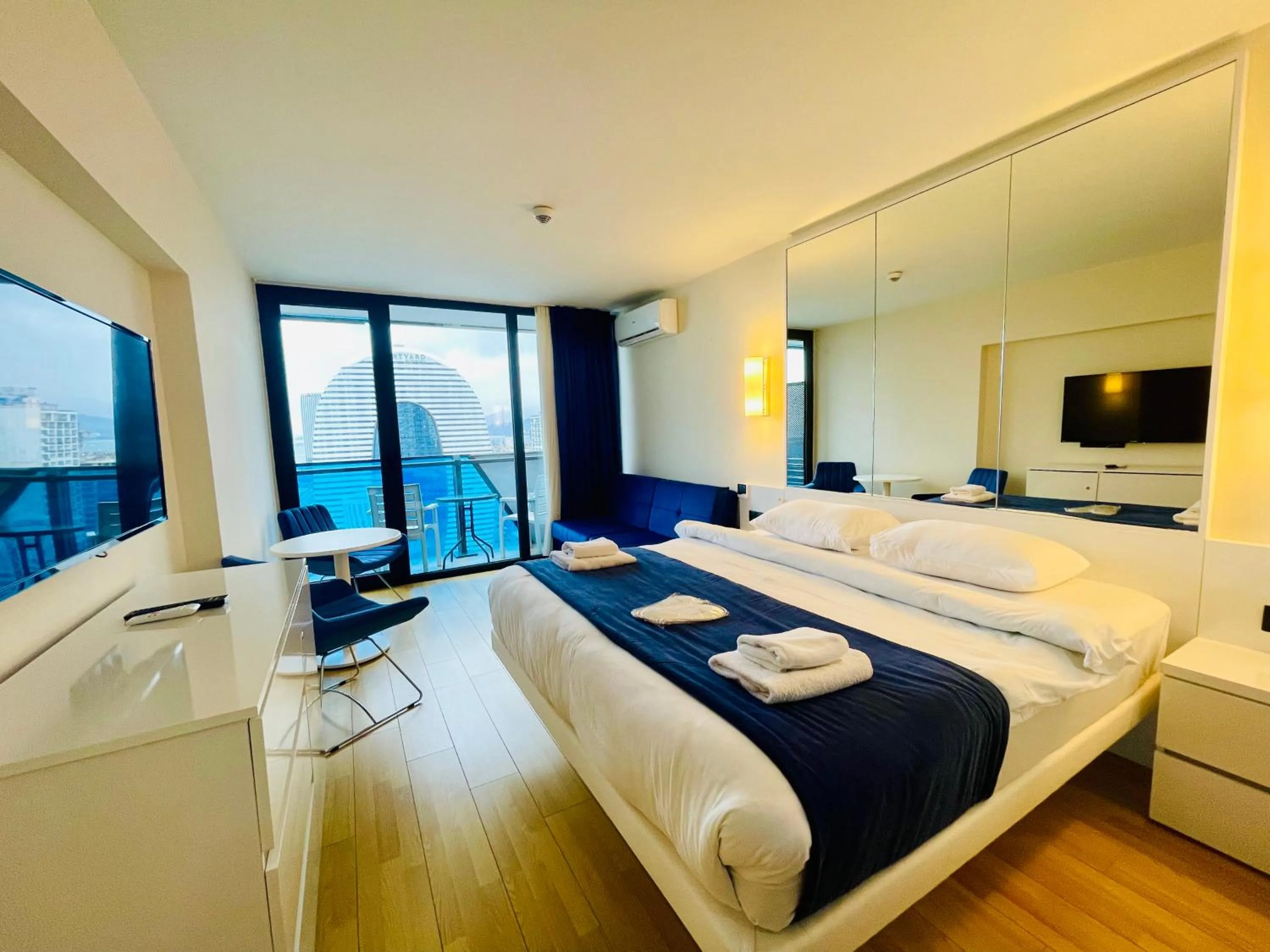 Bed in Royal Sea Breeze Apartments