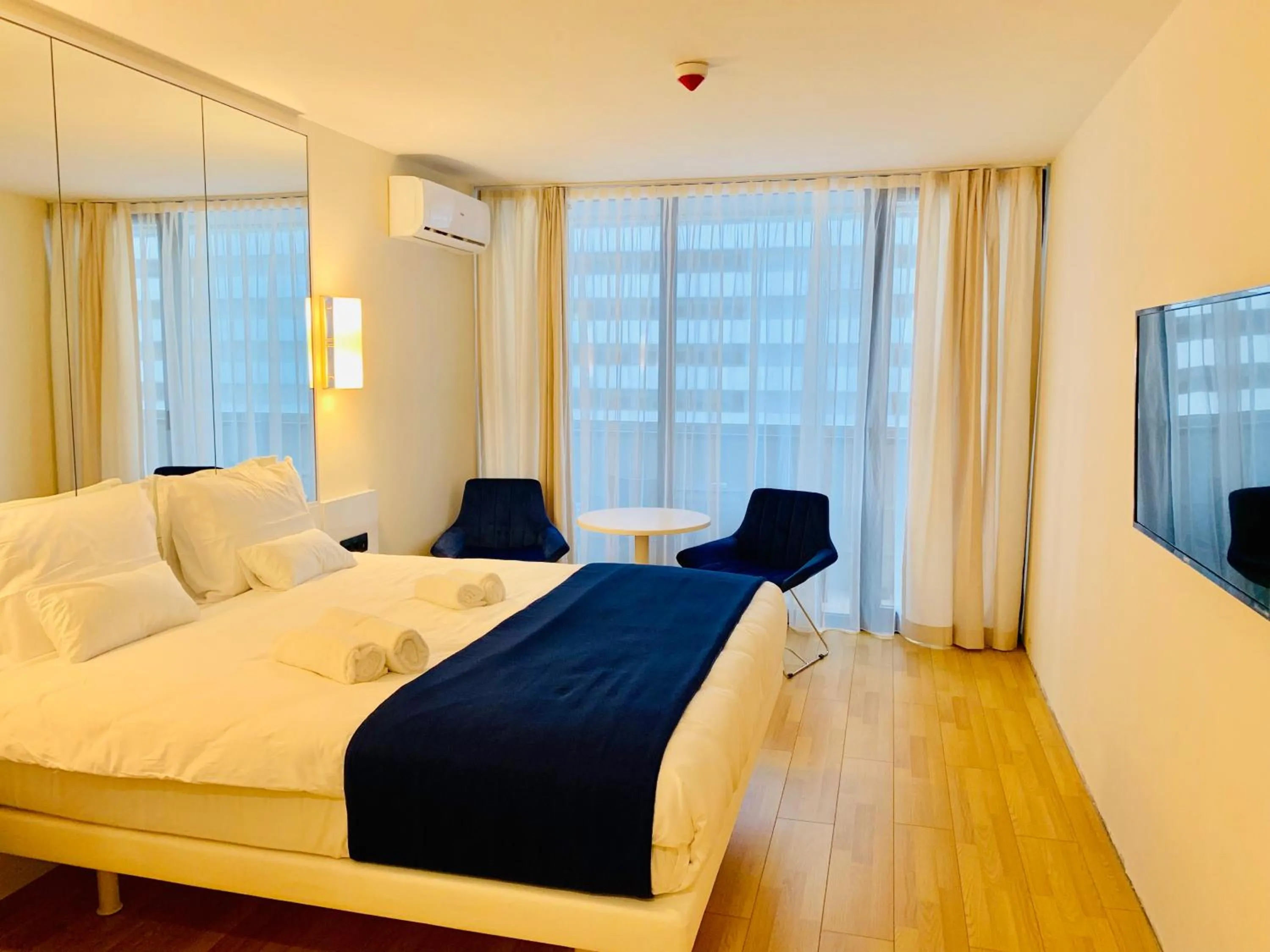 Bed in Royal Sea Breeze Apartments