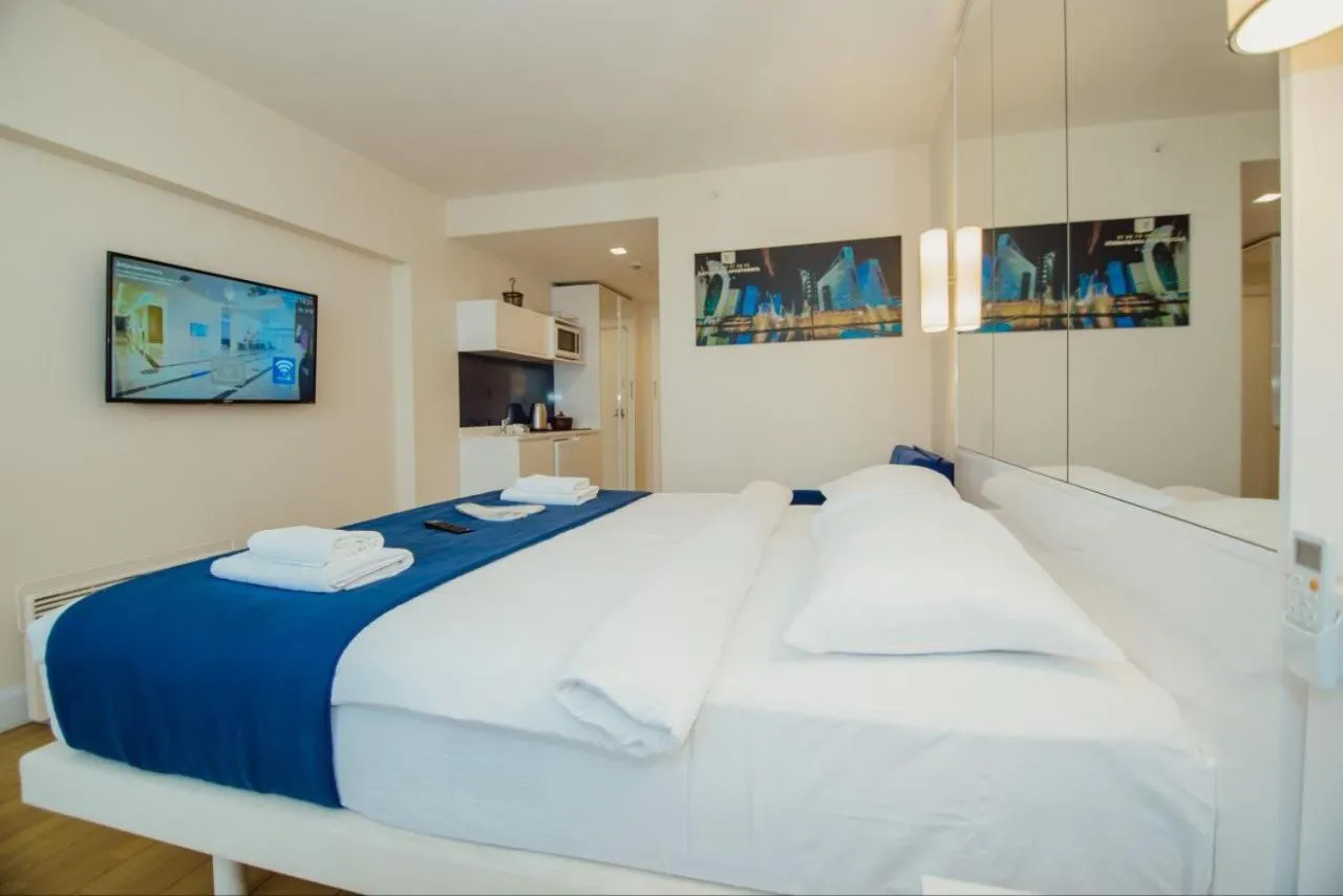 Bed in Royal Sea Breeze Apartments