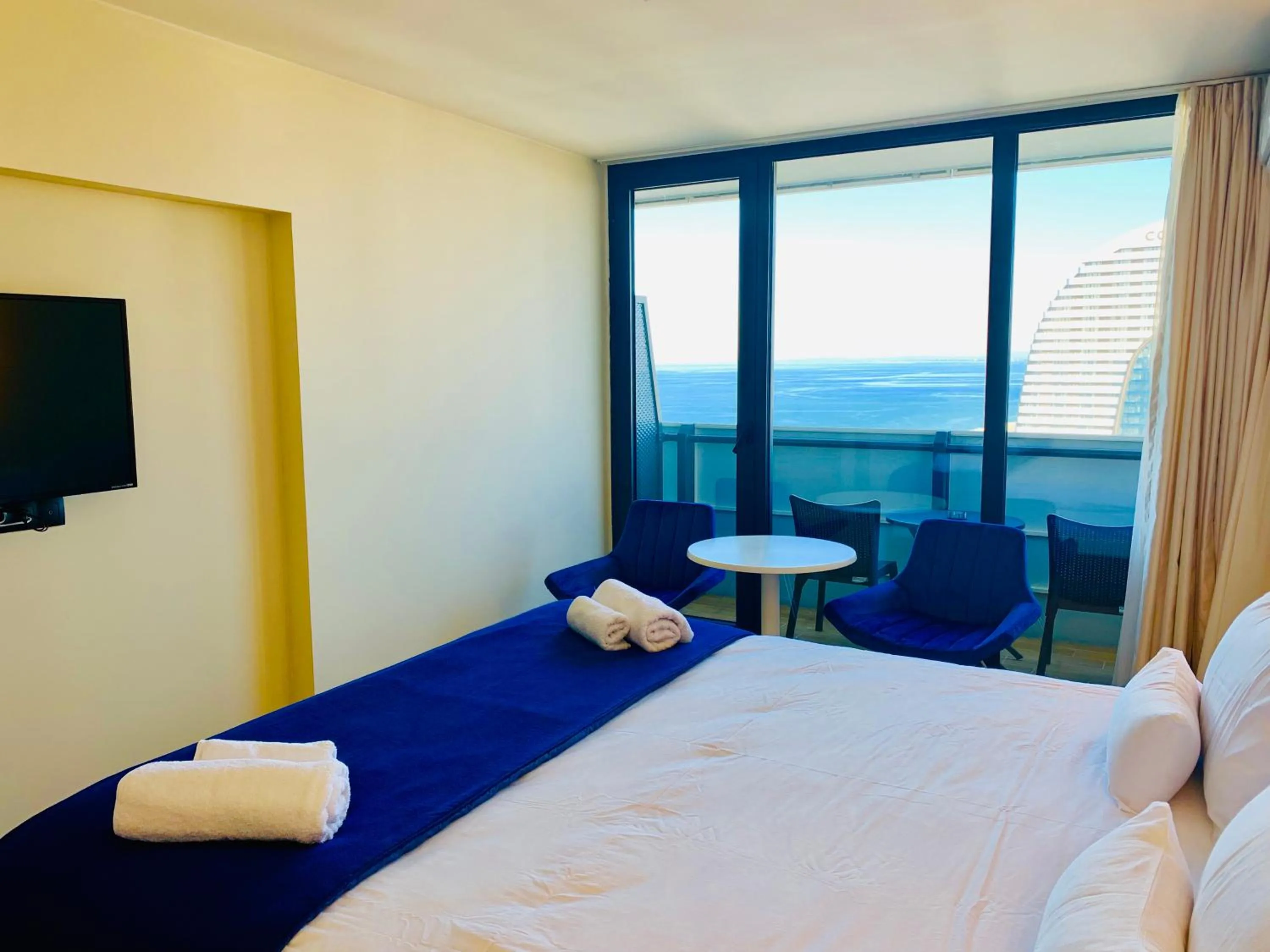 Bed in Royal Sea Breeze Apartments