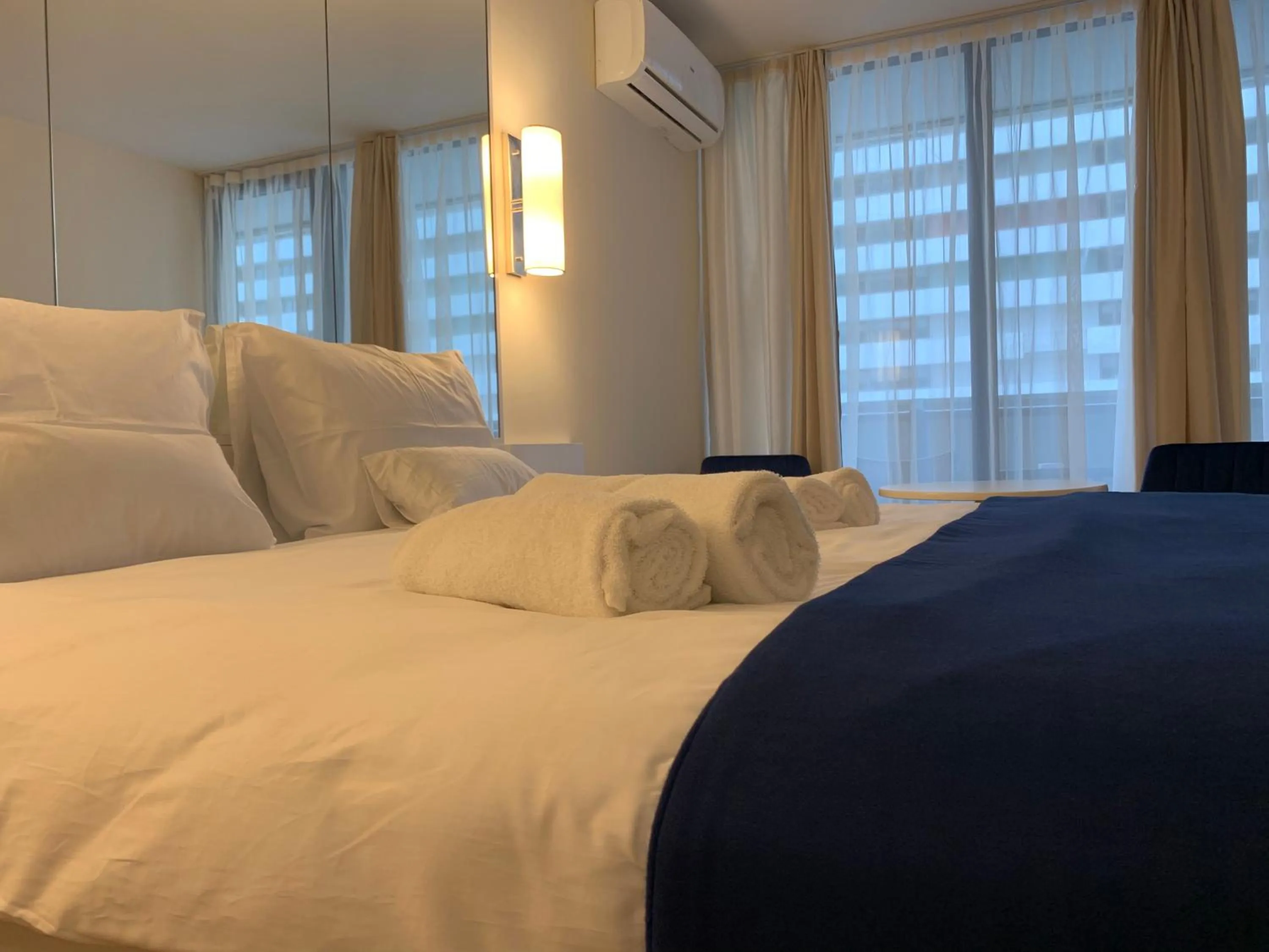 Bed in Royal Sea Breeze Apartments