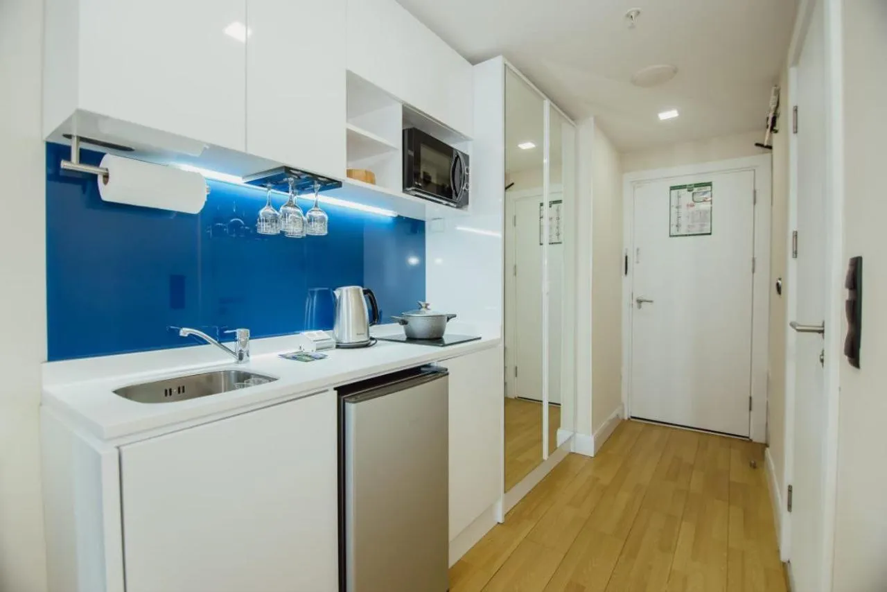 Kitchen or kitchenette in Royal Sea Breeze Apartments