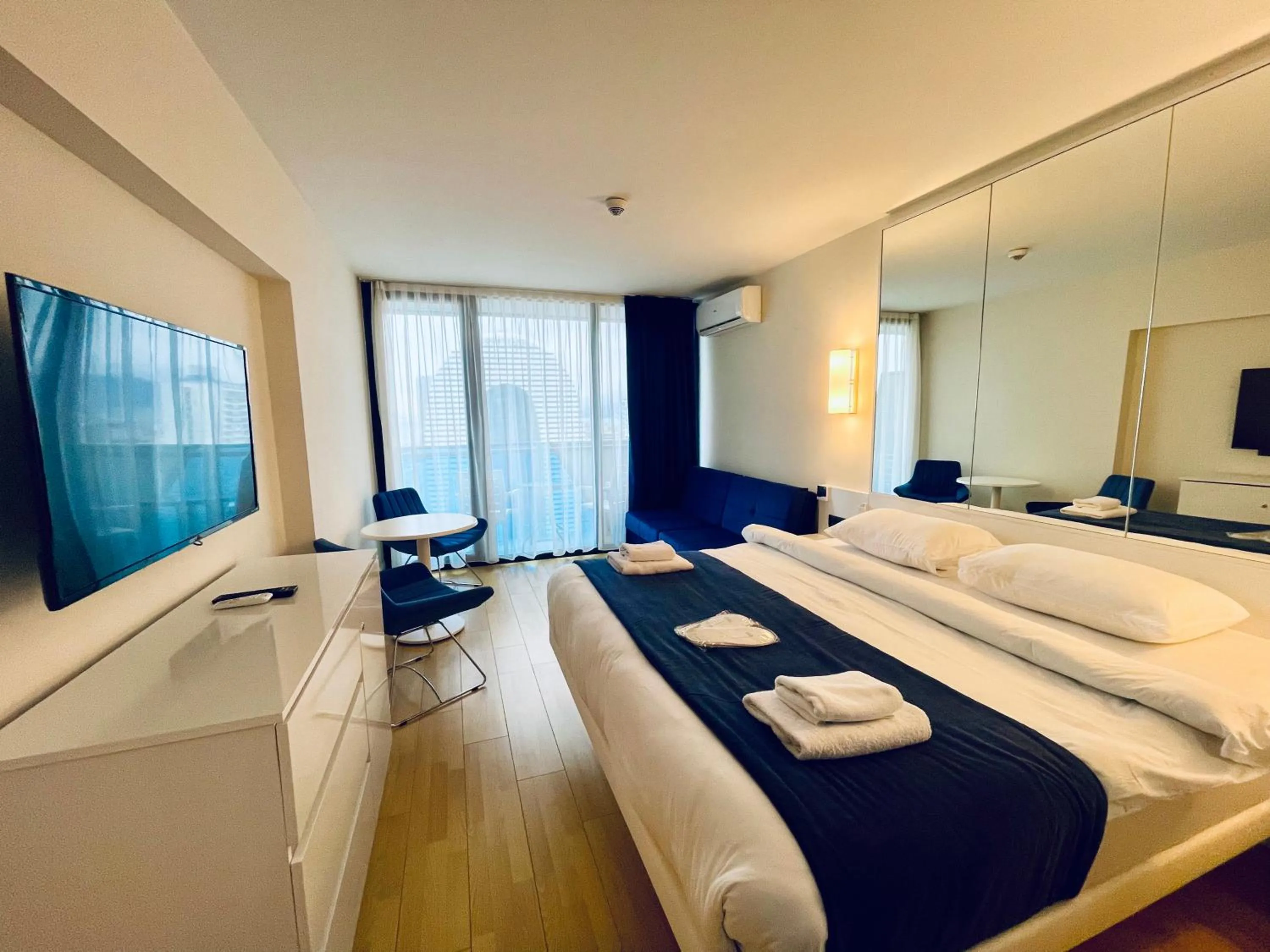 Bed in Royal Sea Breeze Apartments