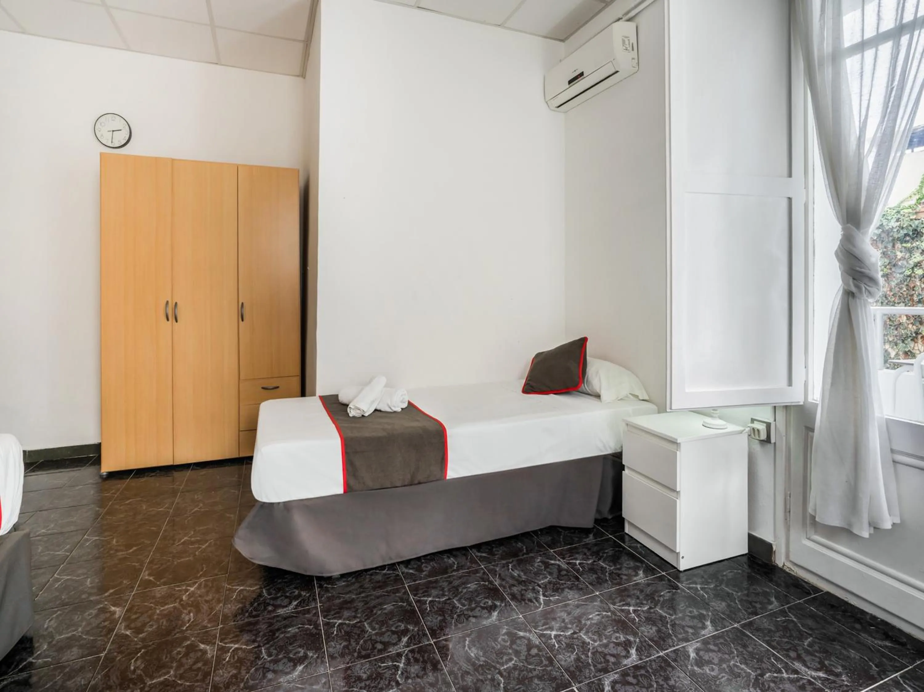 Photo of the whole room, Bed in Hostal Patio de La Luna