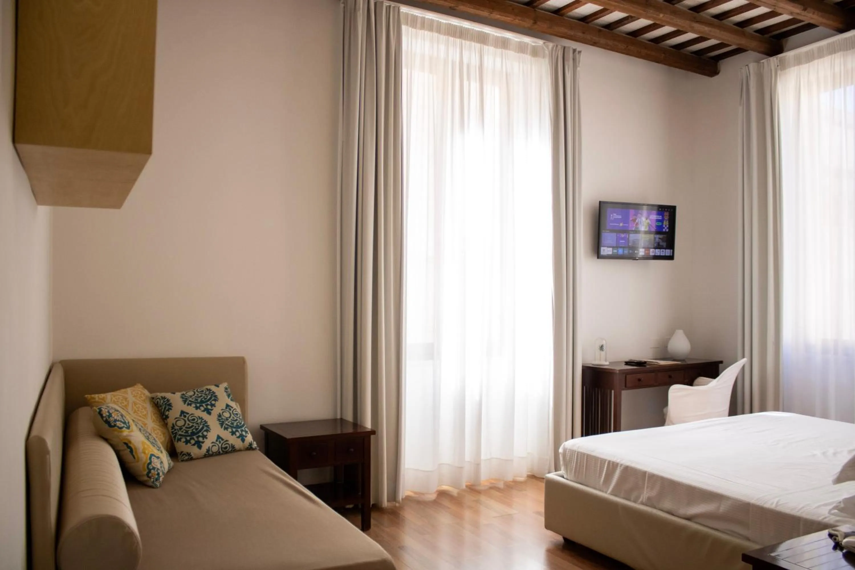 Bed in BADIA NUOVA Apart Hotel