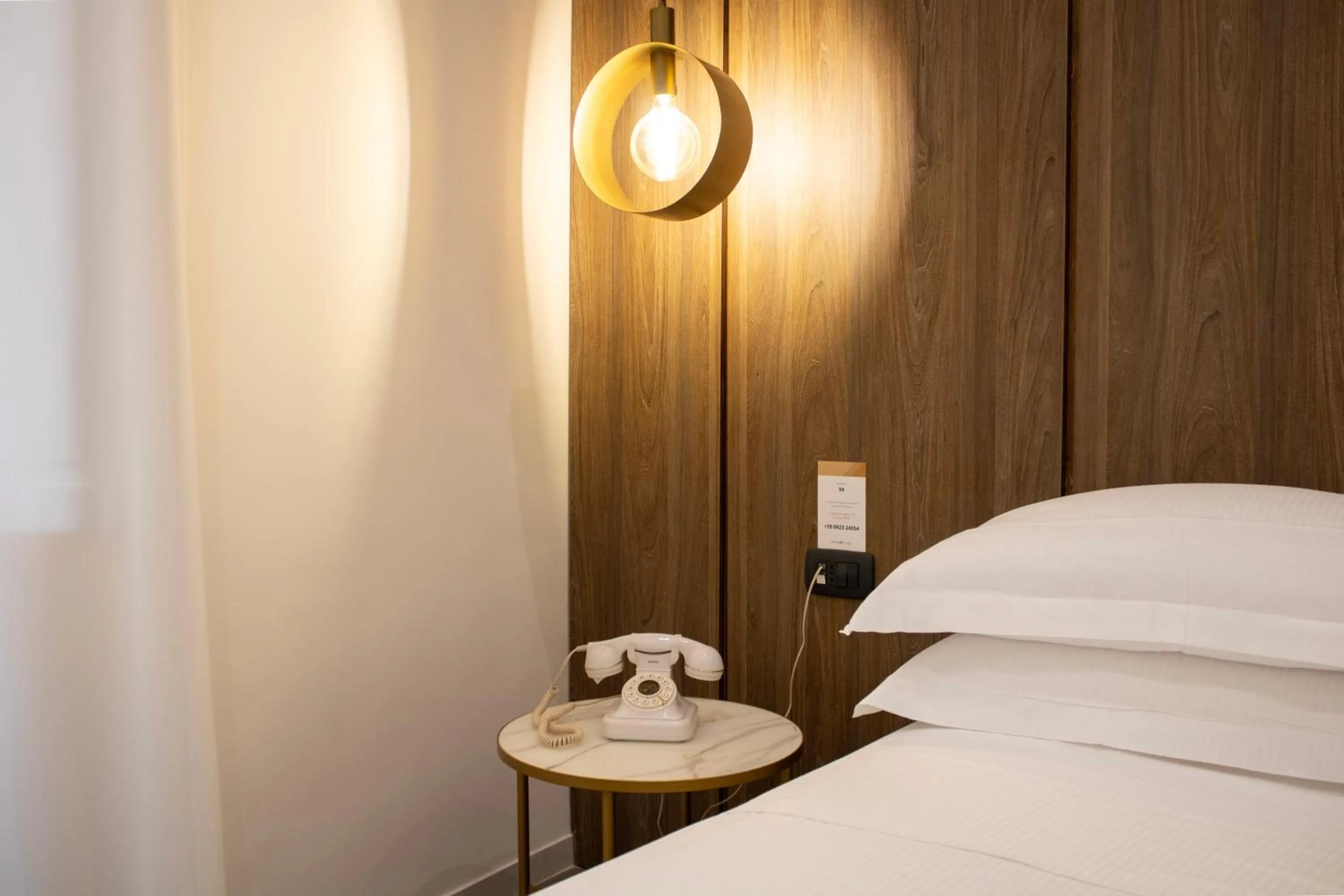 Bed in BADIA NUOVA Apart Hotel