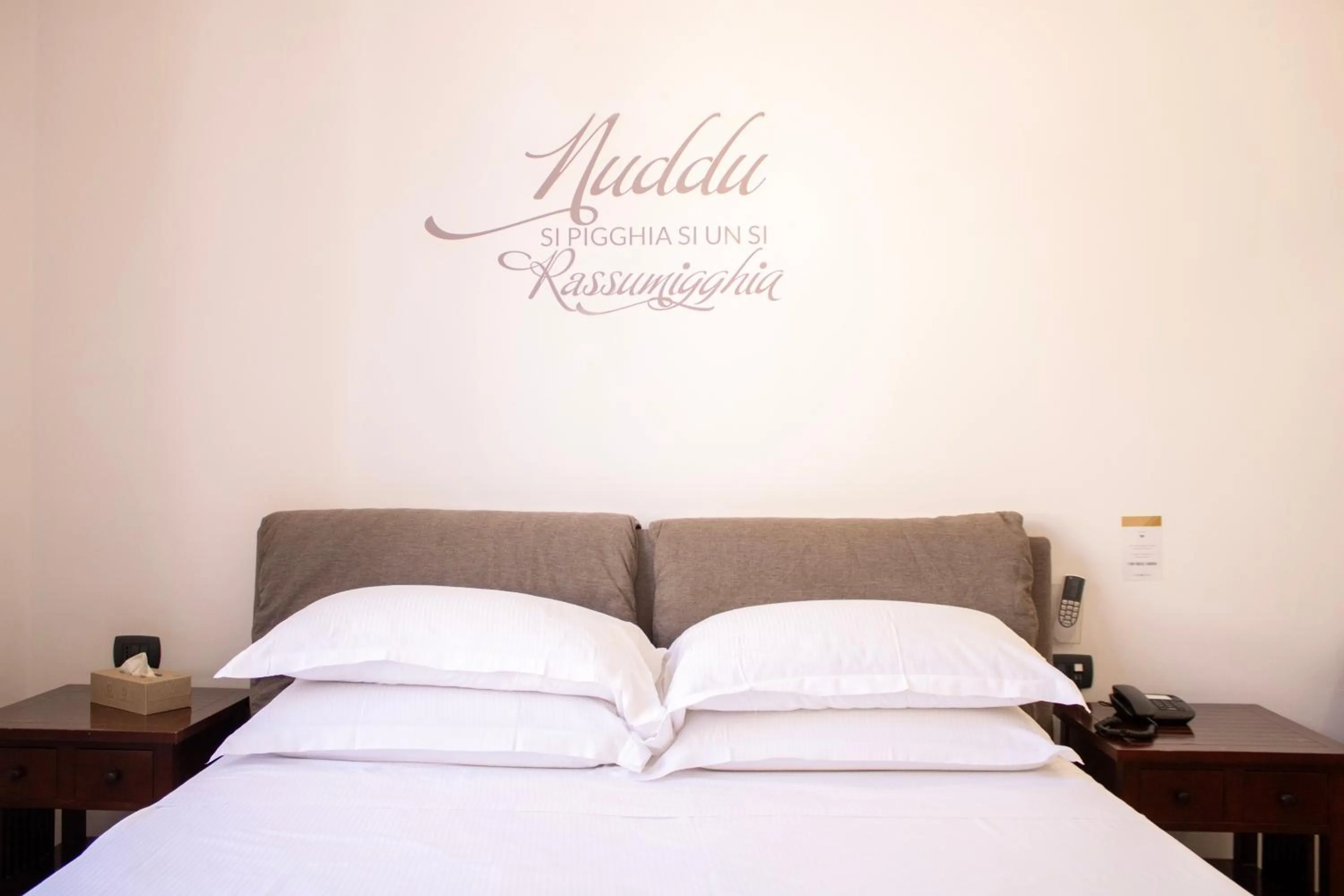 Bed in BADIA NUOVA Apart Hotel