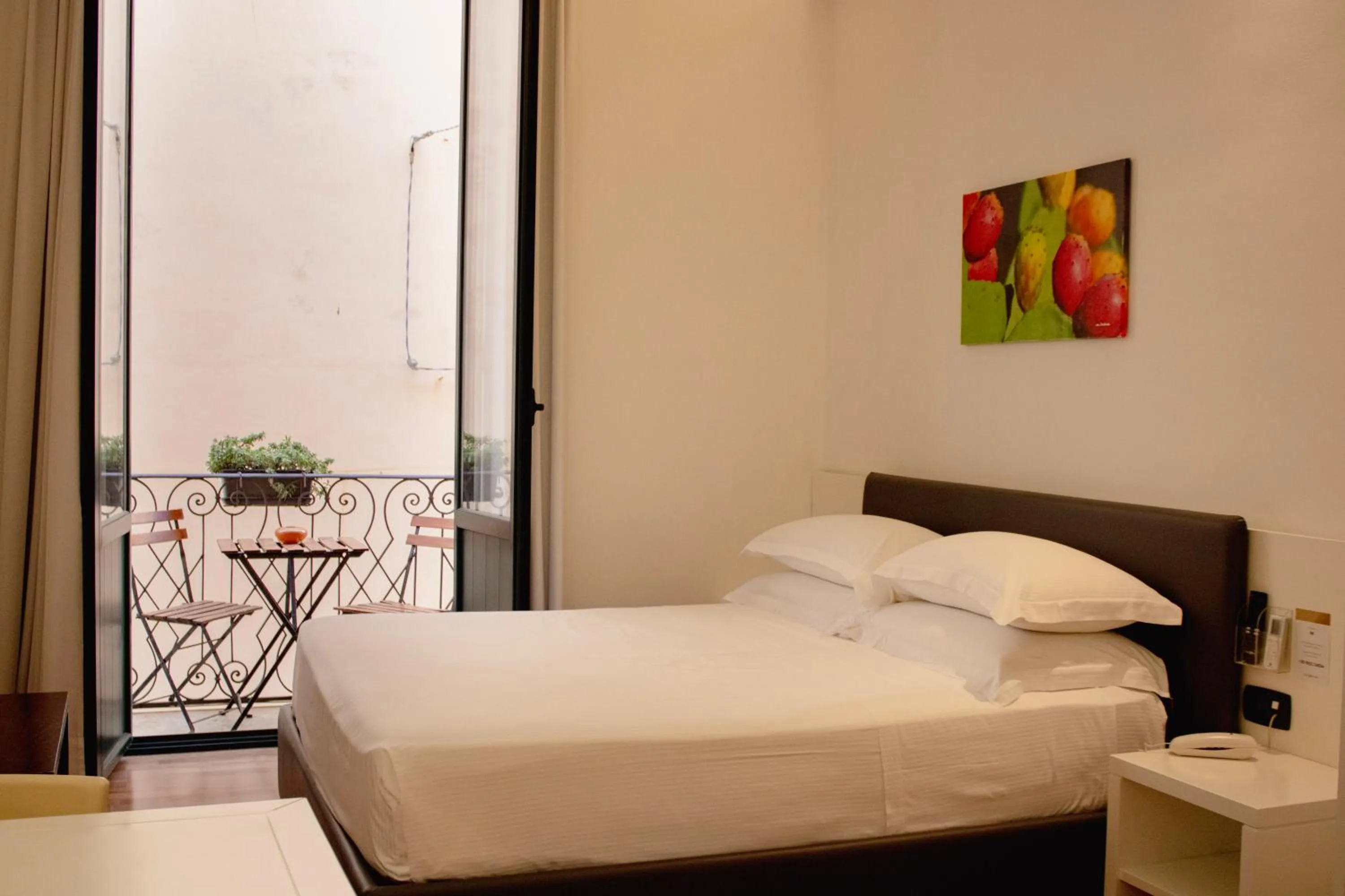 Bed in BADIA NUOVA Apart Hotel