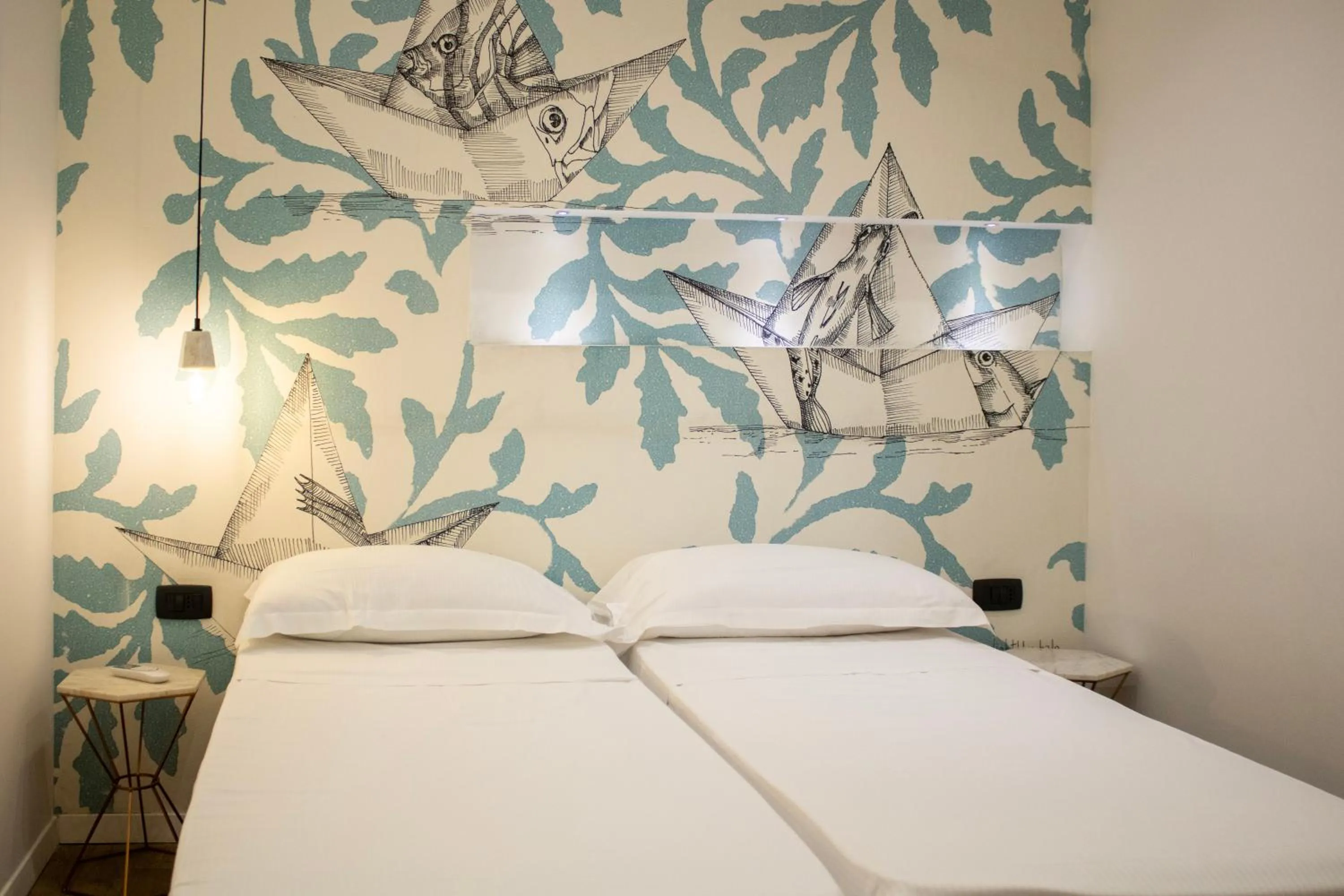 Bed in BADIA NUOVA Apart Hotel