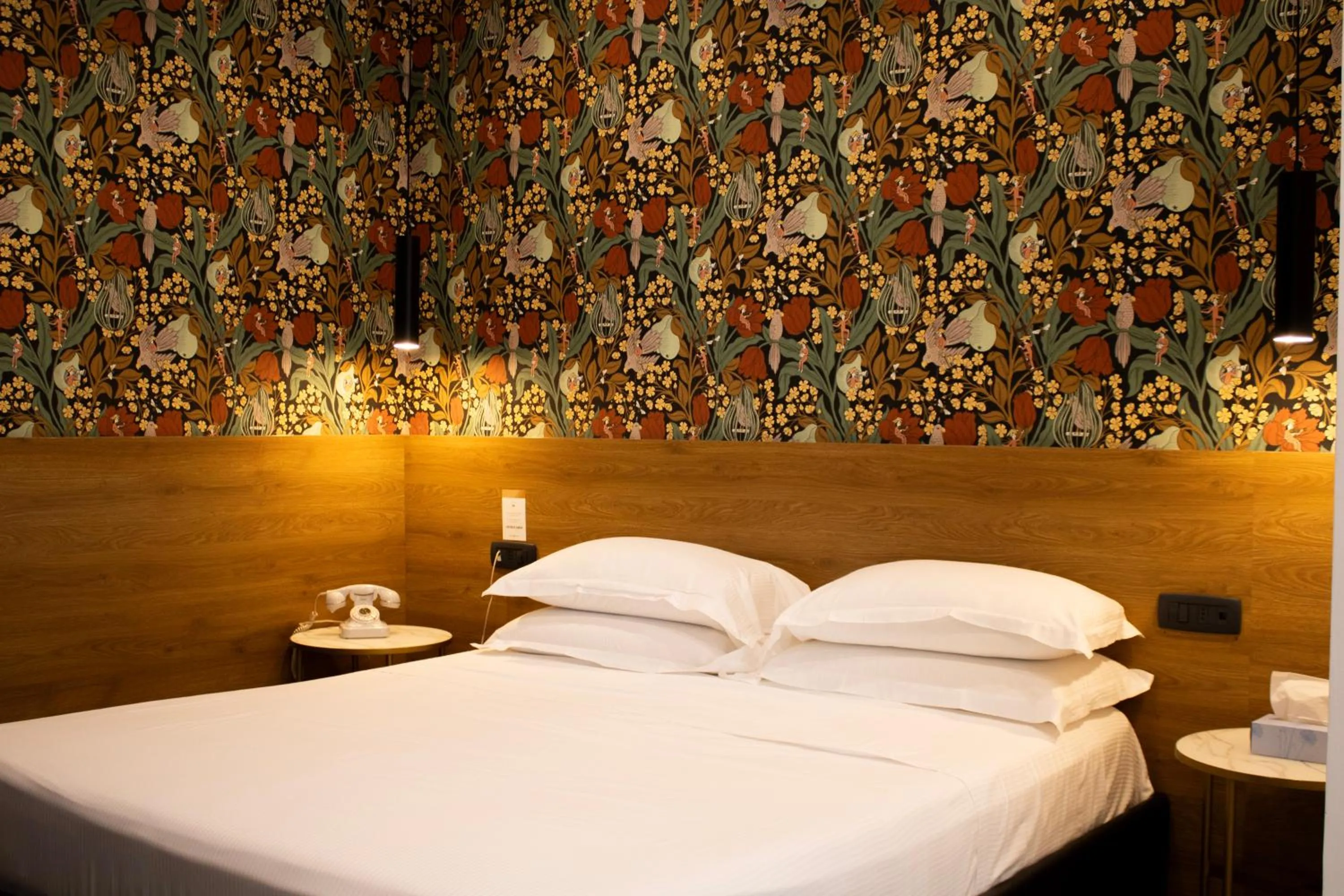 Bed in BADIA NUOVA Apart Hotel