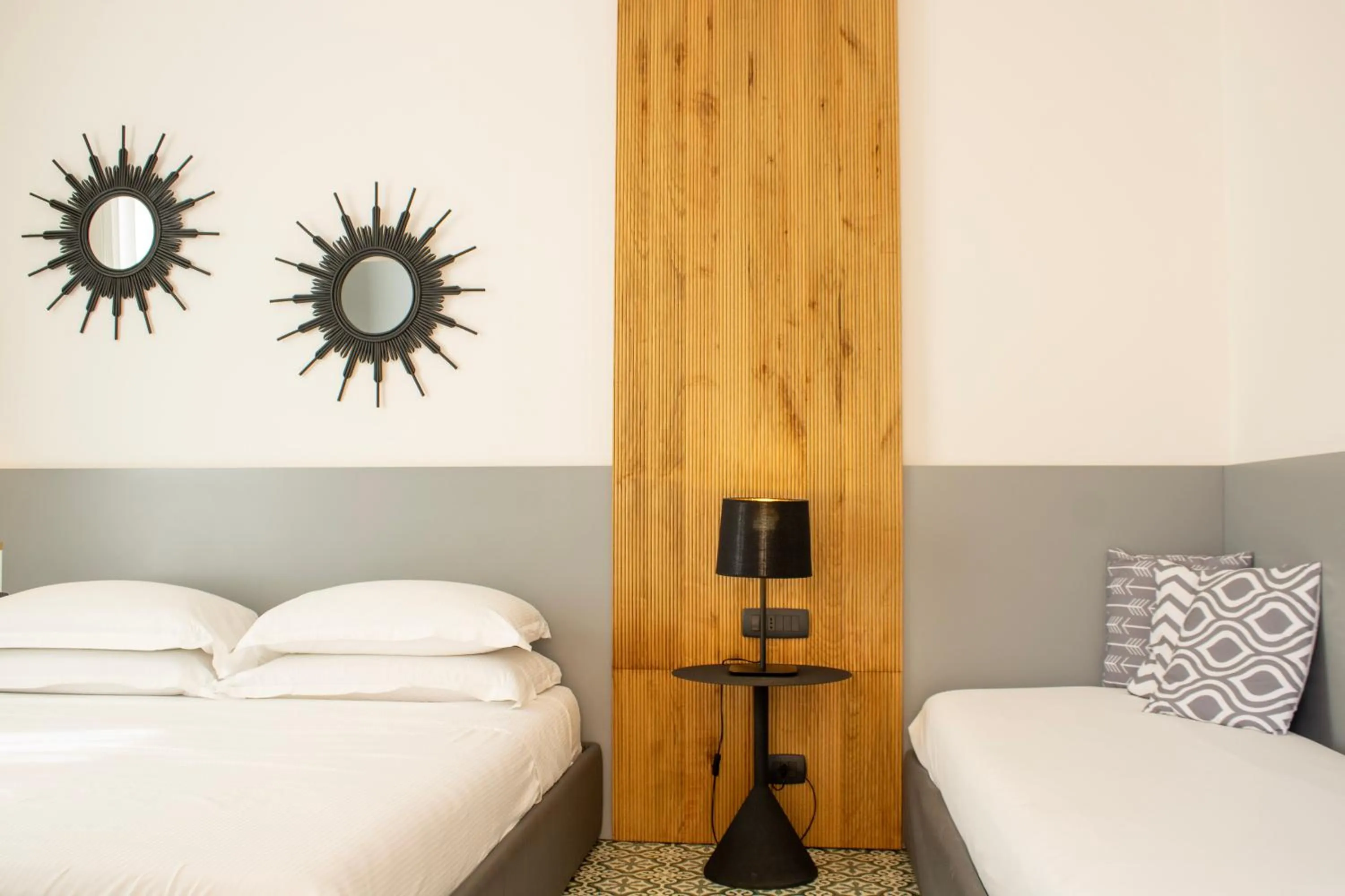 Bed in BADIA NUOVA Apart Hotel