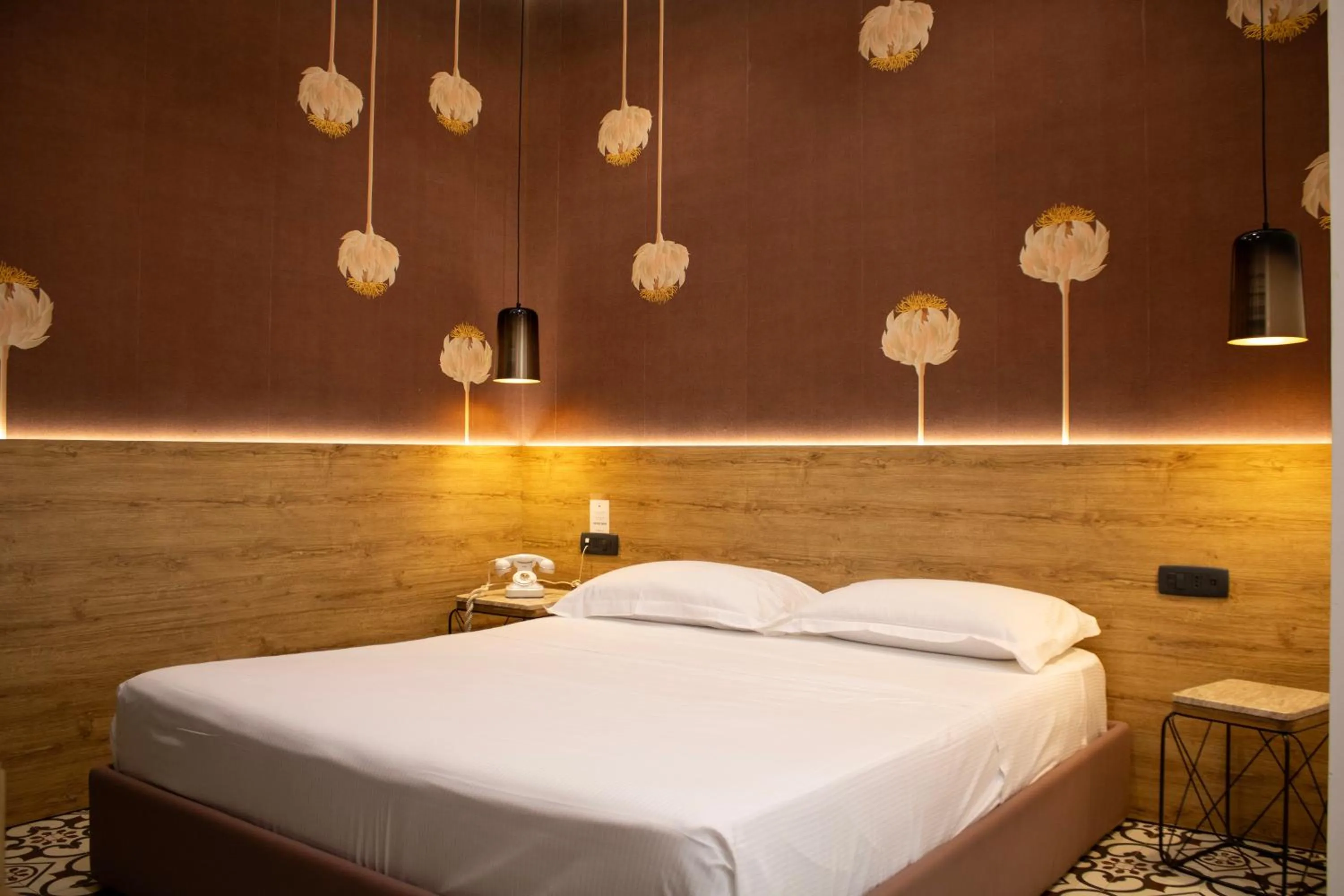 Bed in BADIA NUOVA Apart Hotel