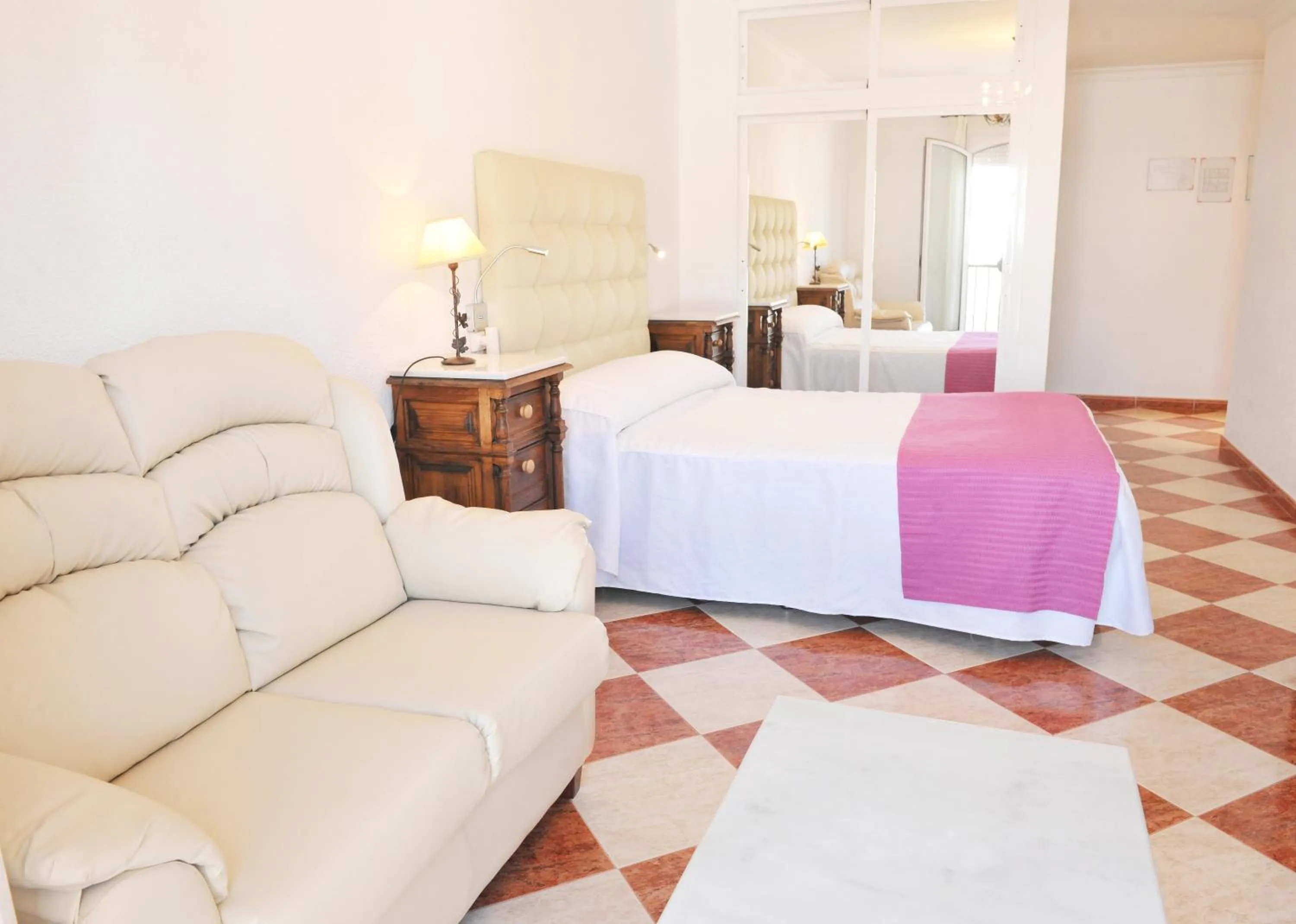 Photo of the whole room, Bed in Hostal Puerto Lepe