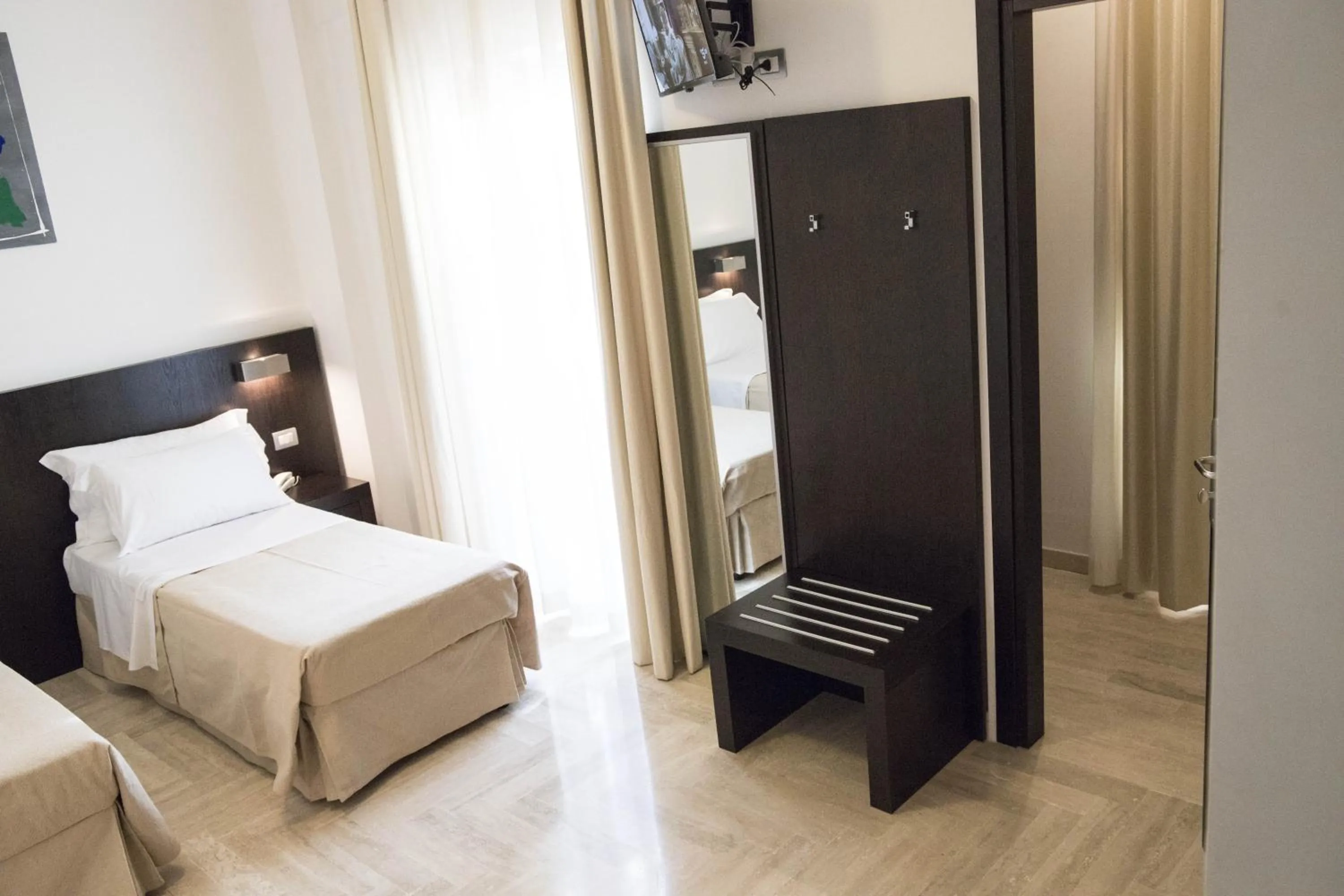 Bed in Albergo Cantiani