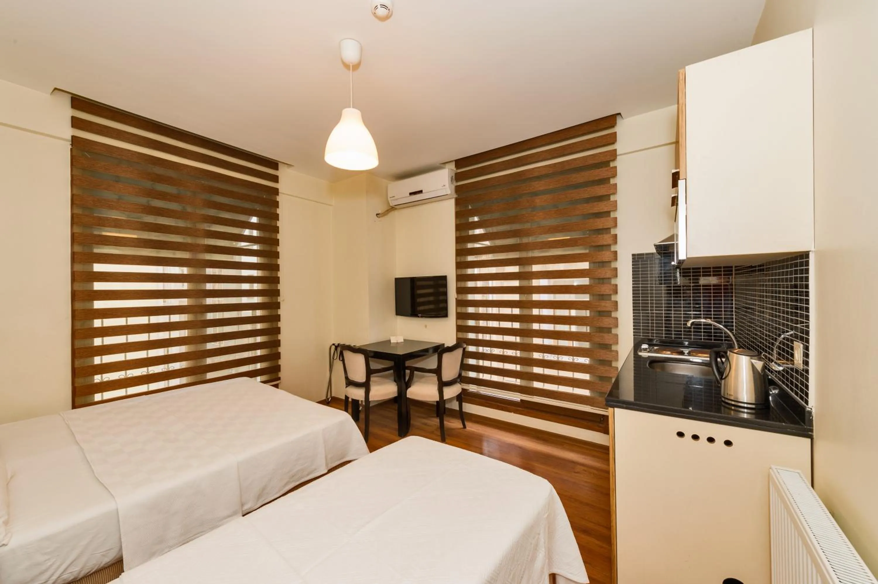 Bed in Invictum Residence