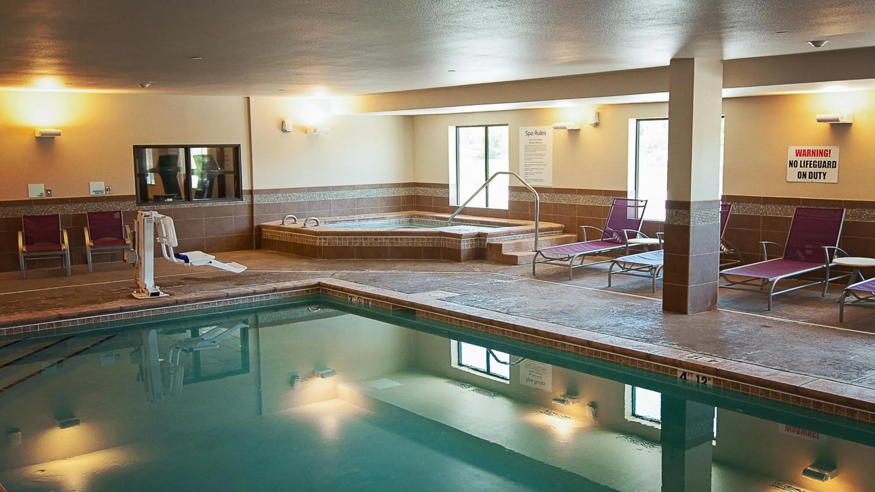 Swimming pool in Holiday Inn Express Hotel & Suites Wichita Northeast by IHG
