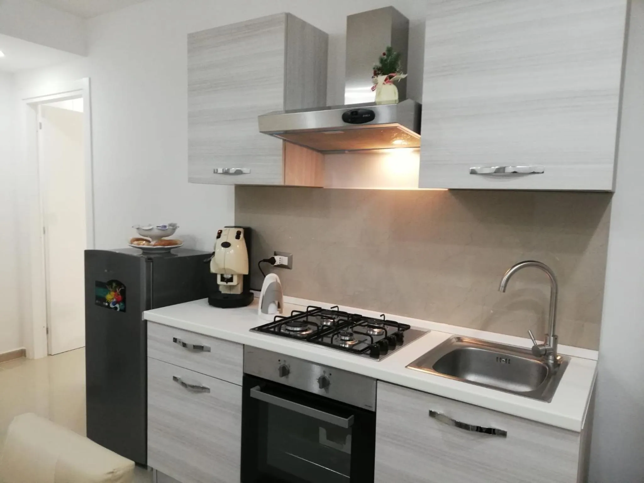Kitchen or kitchenette in B&B Oplonti Resort