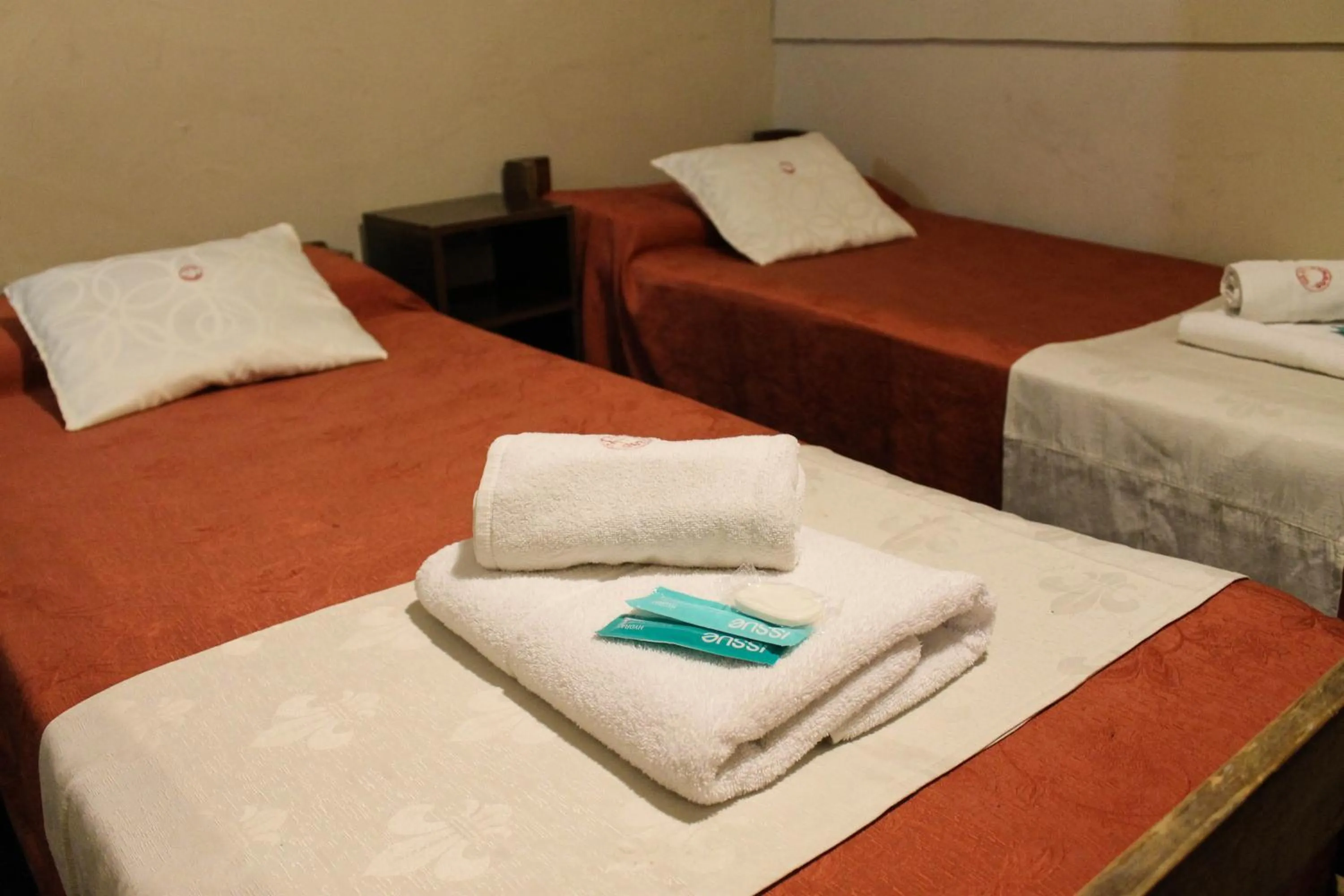 Bed in Casi Guemes Hotel