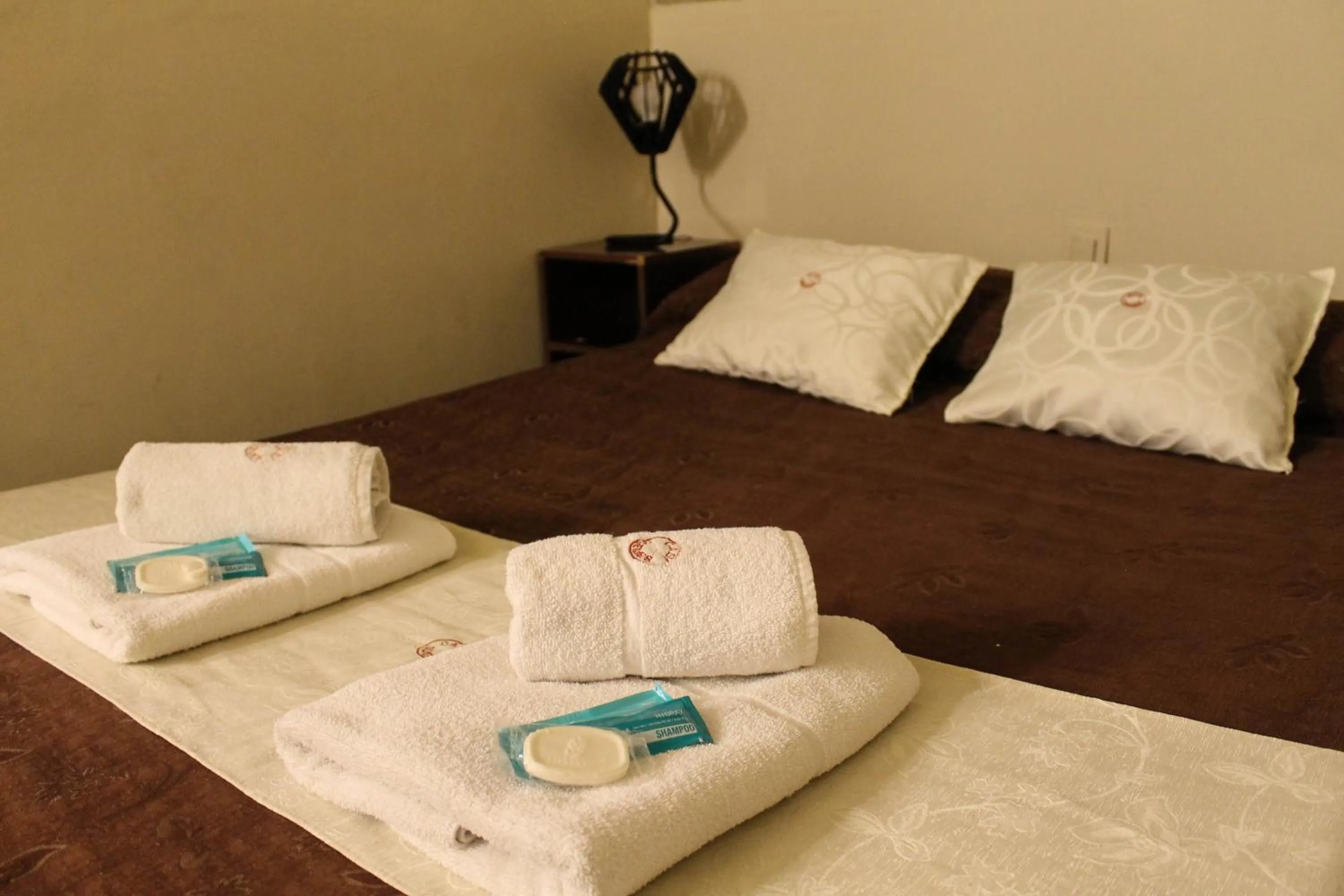 Bed in Casi Guemes Hotel