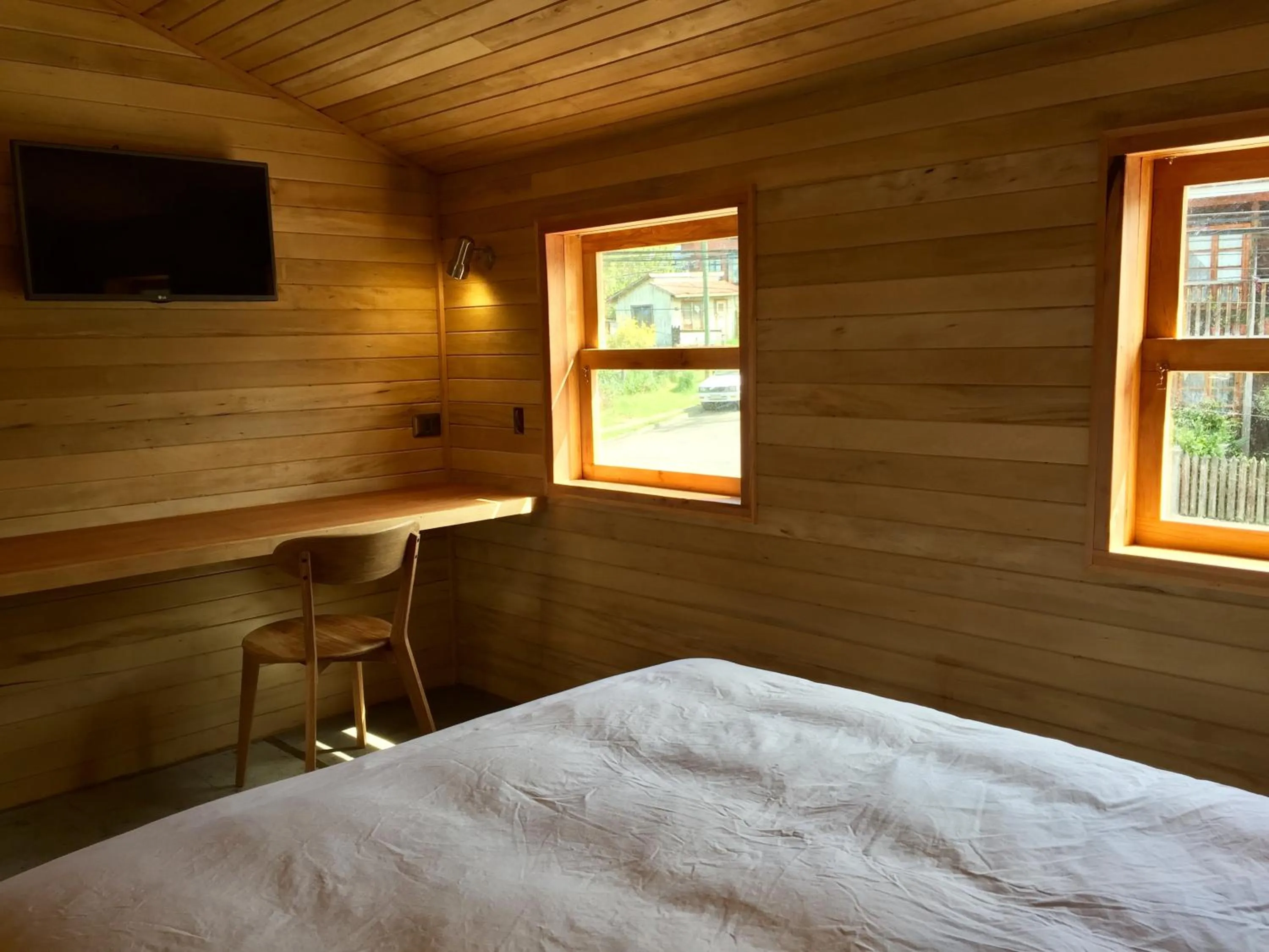 Bed in Palafito Azul Apart Hotel