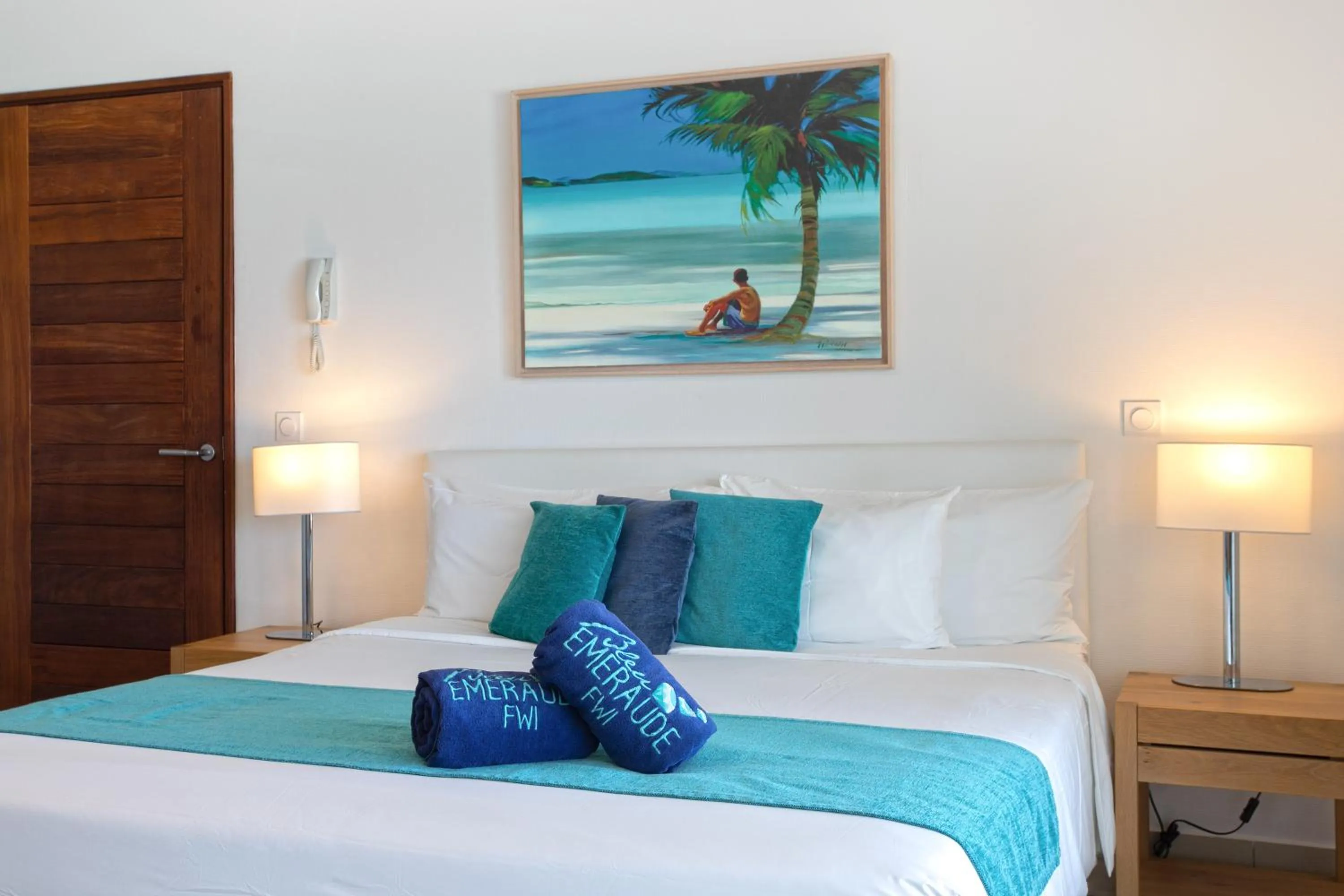 Bed in Bleu Emeraude Hotel