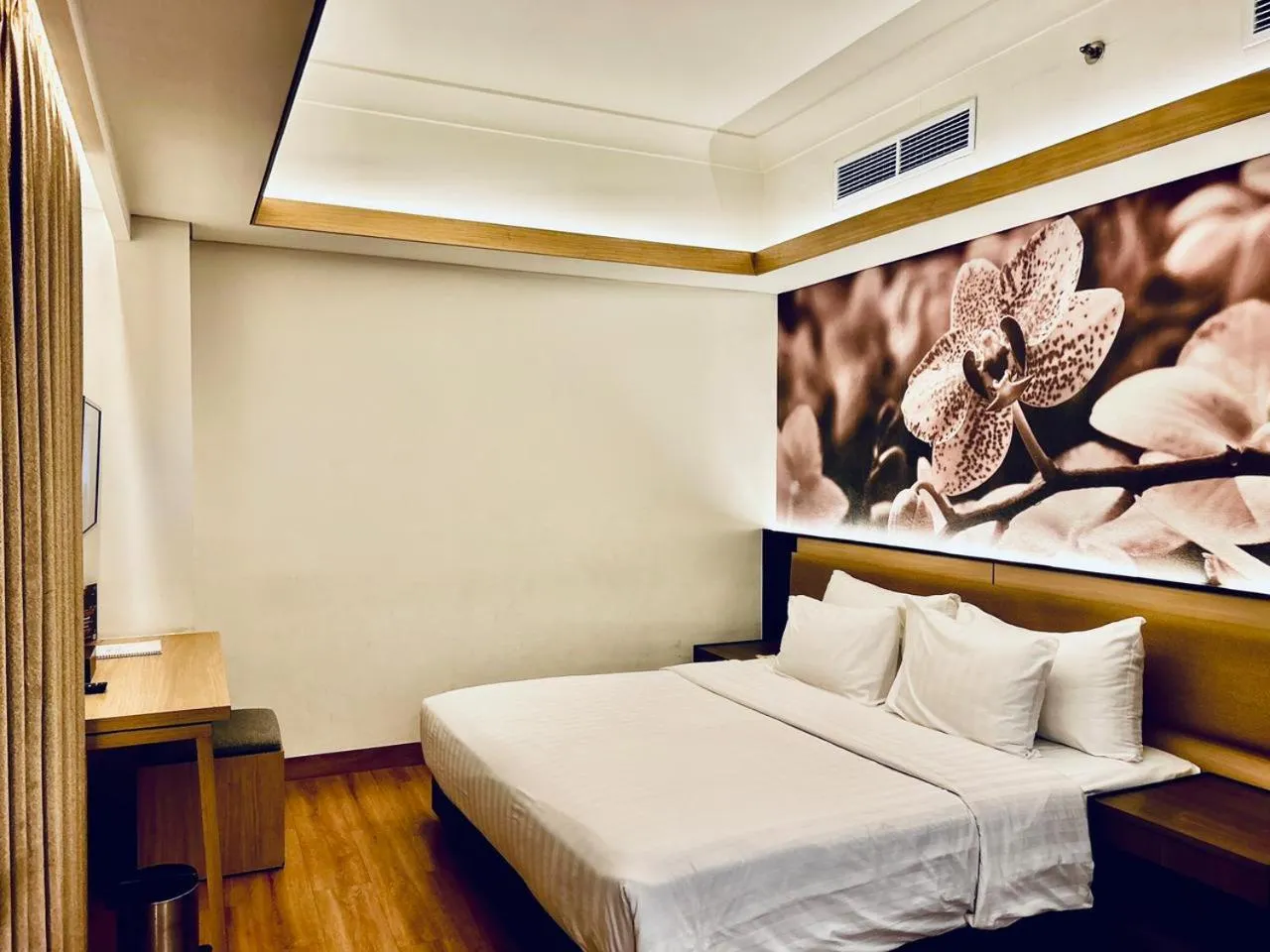 Bed in Orchardz Jayakarta