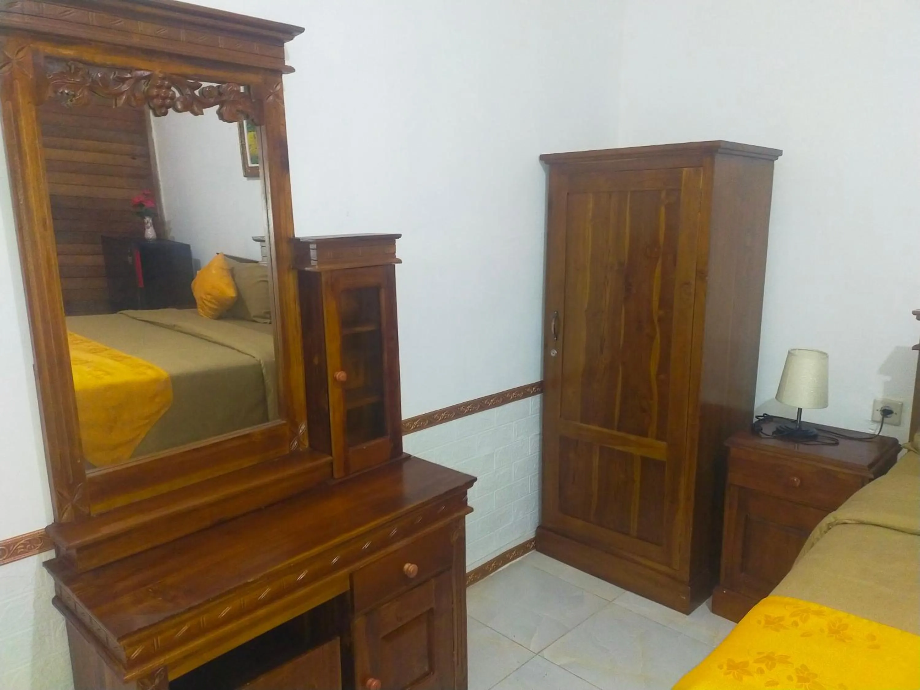 Photo of the whole room, Bed in The Rahayu Cottage