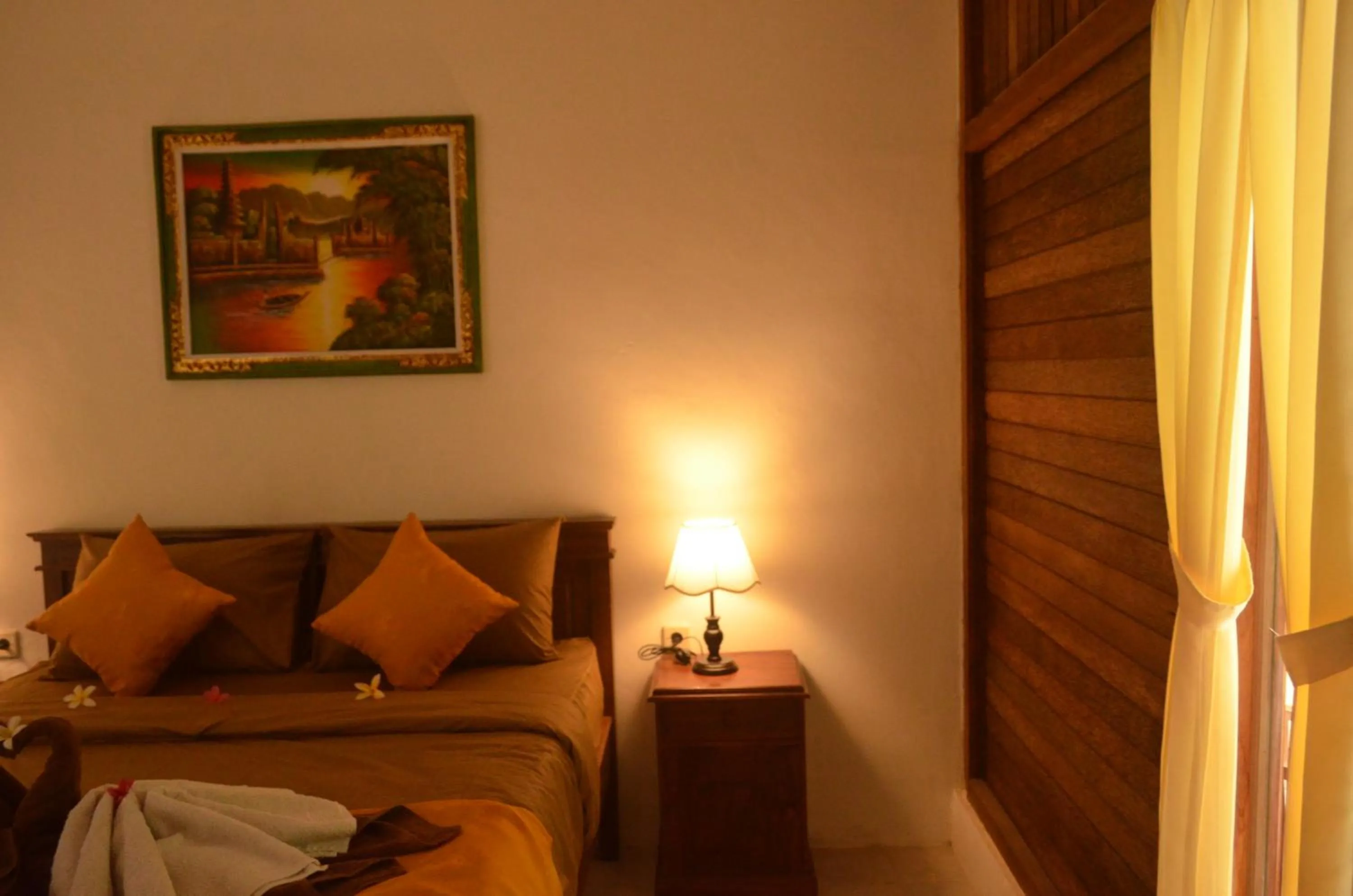Bed in The Rahayu Cottage