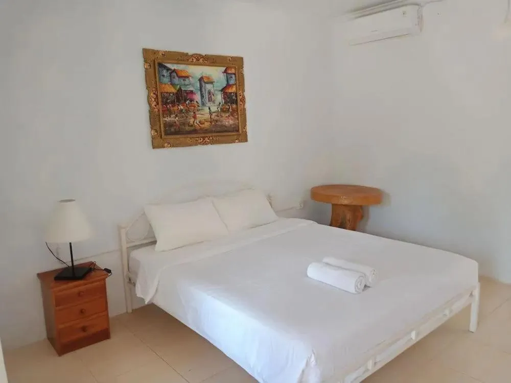 Bed in The Rahayu Cottage