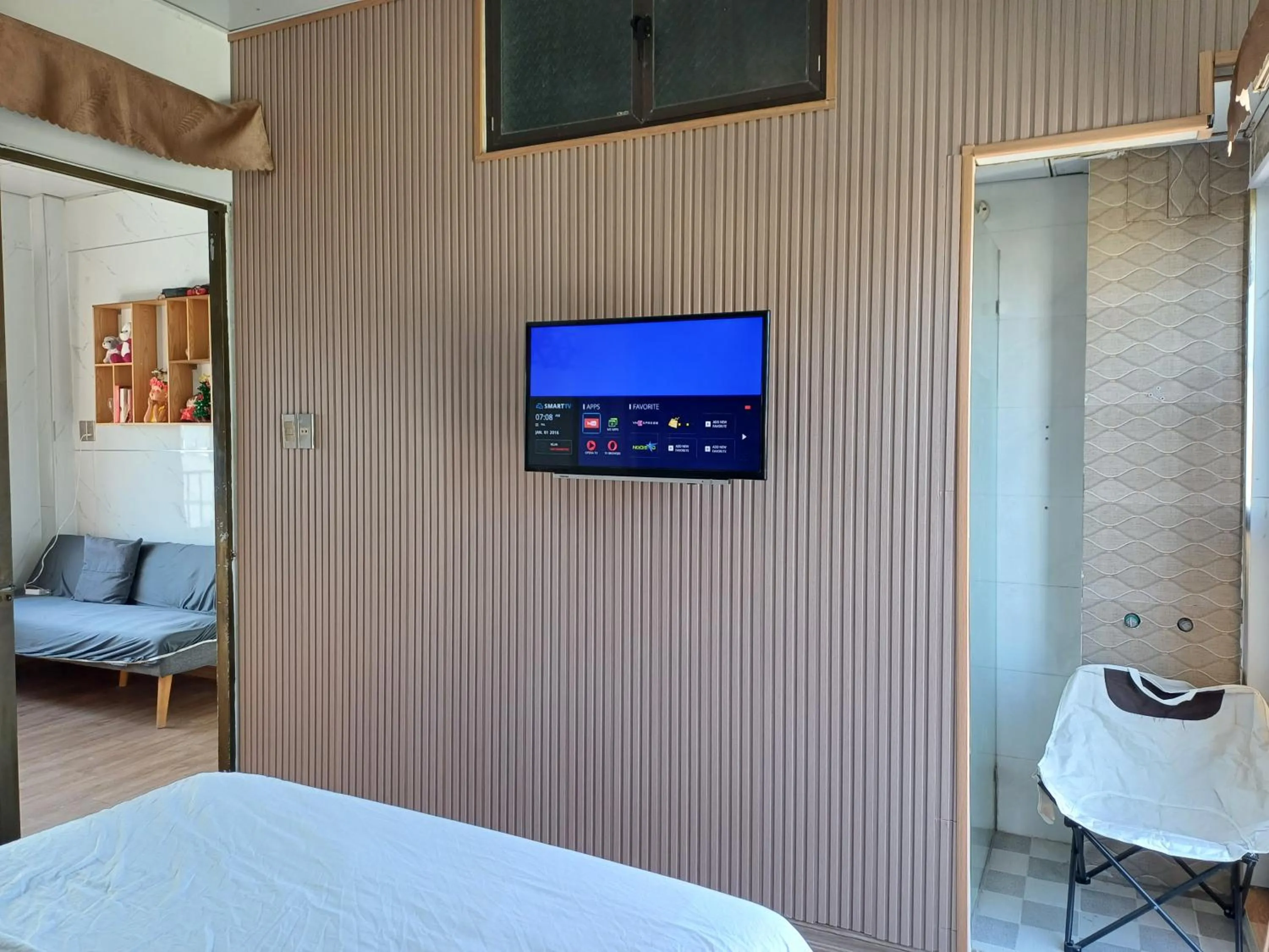 TV and multimedia, Bed in Seashine Apartment