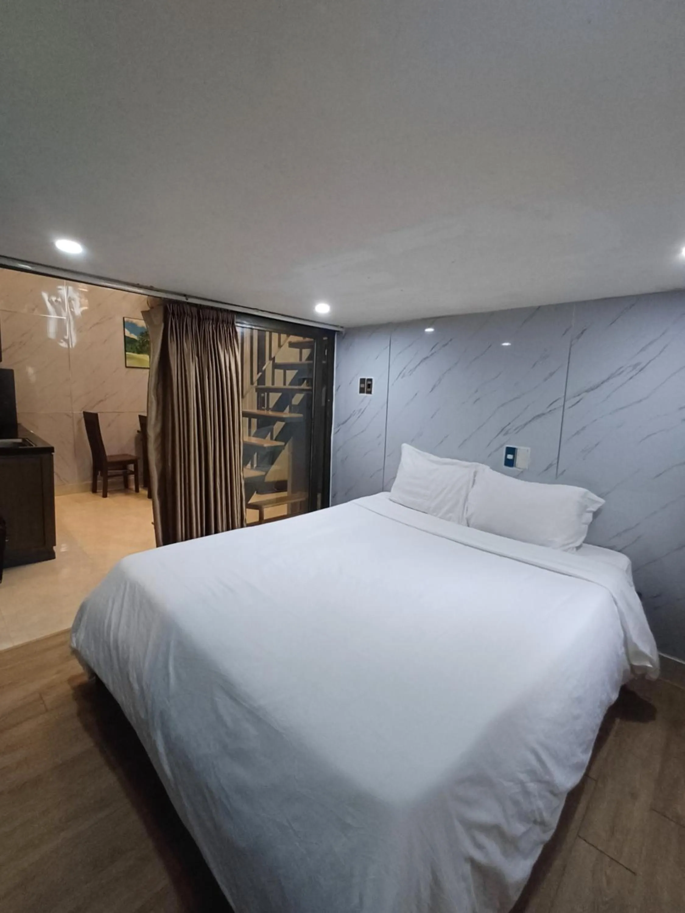 Bed in Seashine Apartment