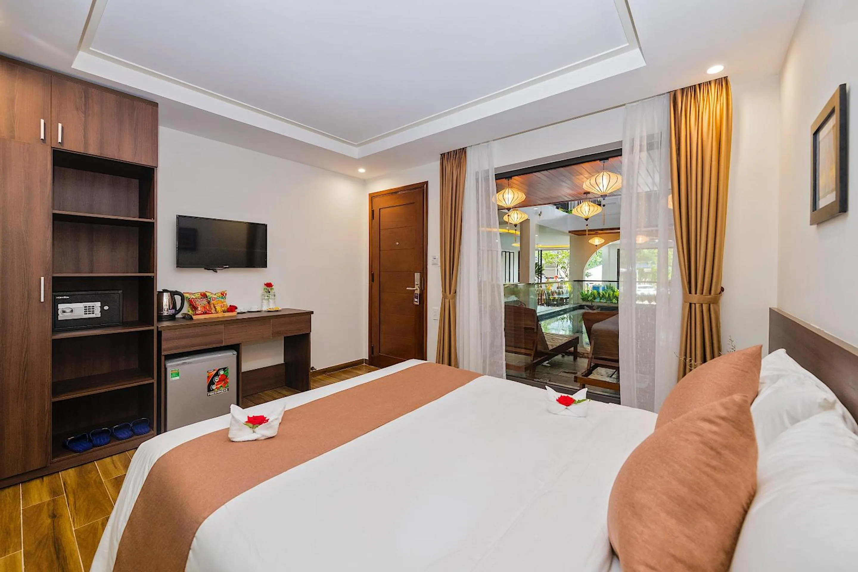 Communal lounge/ TV room, Bed in Brother Villa Hoi An