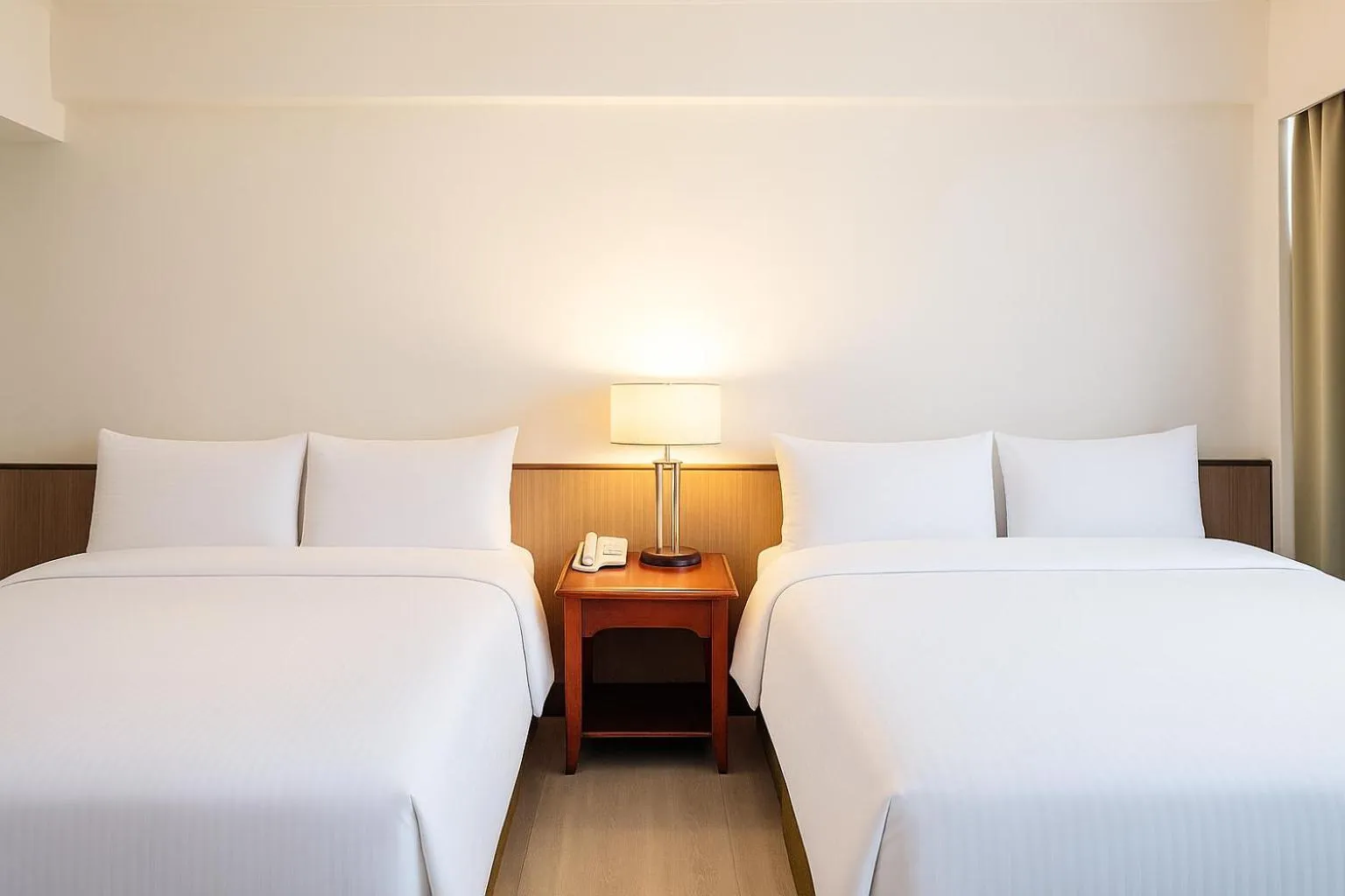 Bed in East Coast Hotel